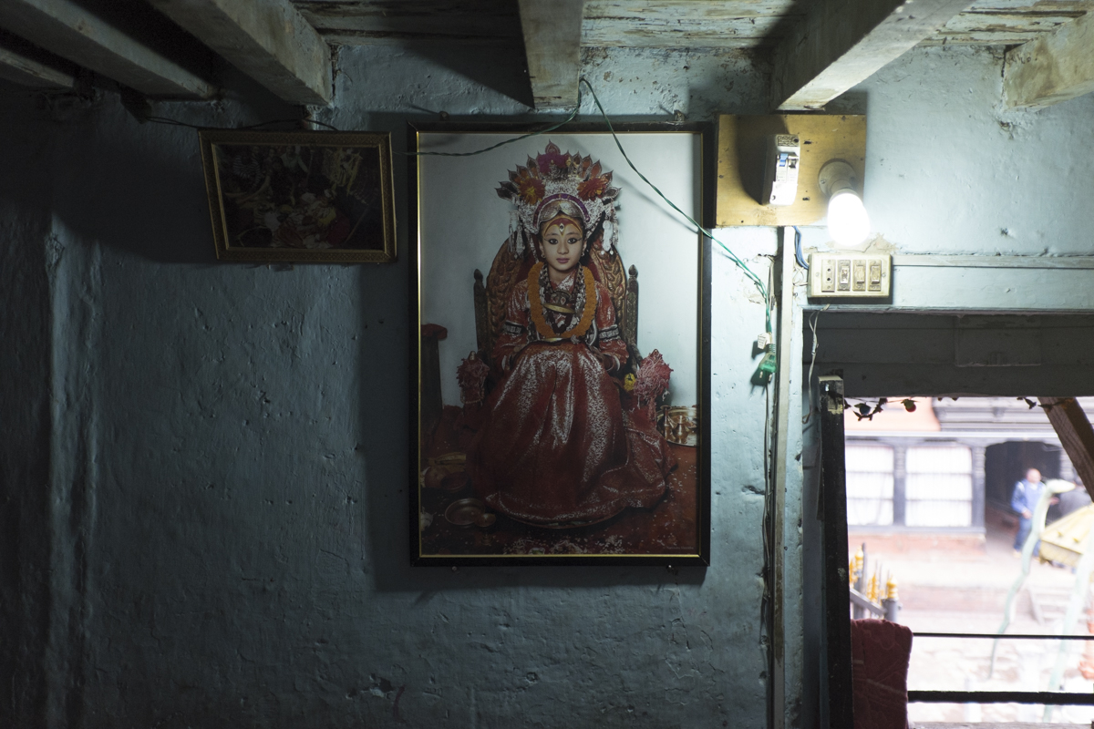 PATAN The Kumari Devi, translated as "virgin goddess", is revered by Hindus and Buddhists as an actual living Goddess. The Kumari is worshipped as the reincarnation of Taleju Bhavani until she reaches menstruation or has a major loss of blood, when it is believed the Goddess vacates the body. Here a photograph of ex-Kumari Samita Bajrachya hangs in her present home, a monestary in the heart of Patan.