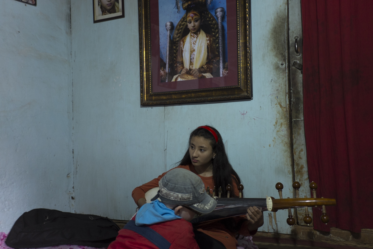 PATAN Samita, now age 14, is the first ex-Kumari to recieve a Christian education and attends St. Xavier's School in Patan. Here she plays the Sarod with her family friend who is diagnosed with Albinism.