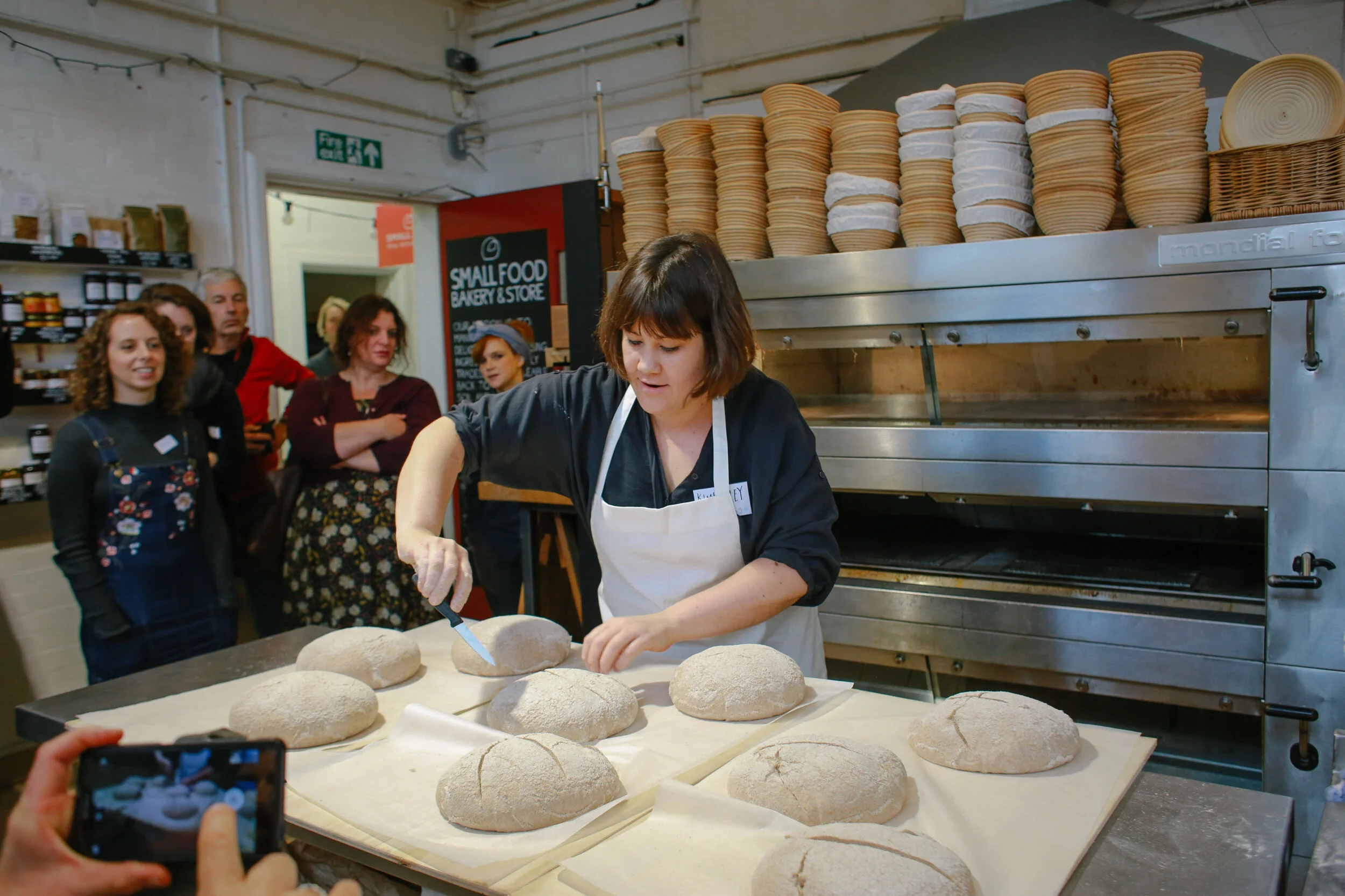 Kimberley Bell demonstrates baking with the YQ - ORC Wakelyns Population at the UK Grain Lab conference. Photo: David Severn