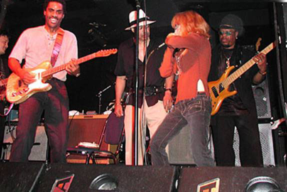 Carol on stage with Kenny Neal and Billy Branch at Buddy Guy's Legends