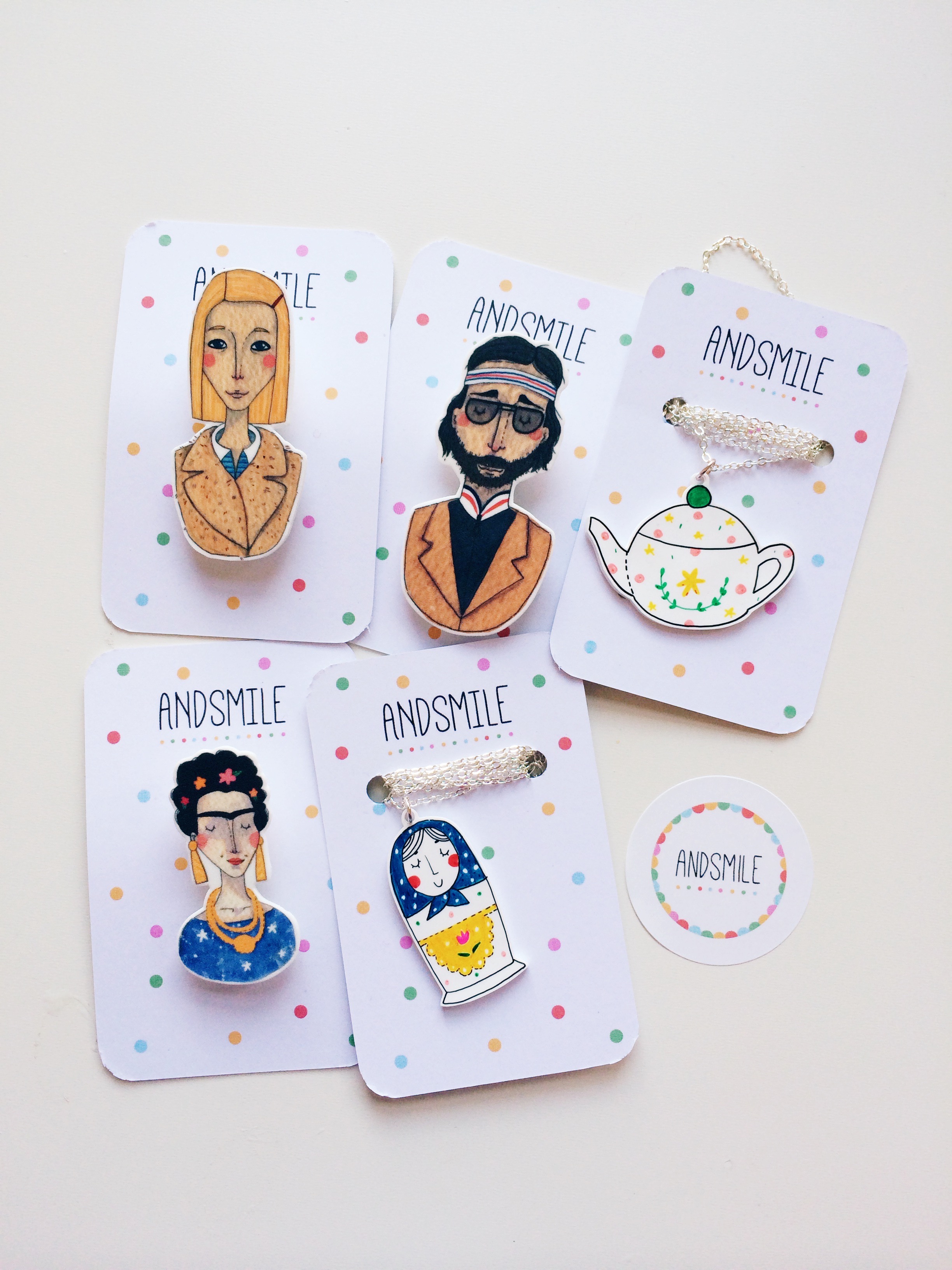 Frida, Margot & Richie are printed and Matryoshka & Teapot are hand drawn.