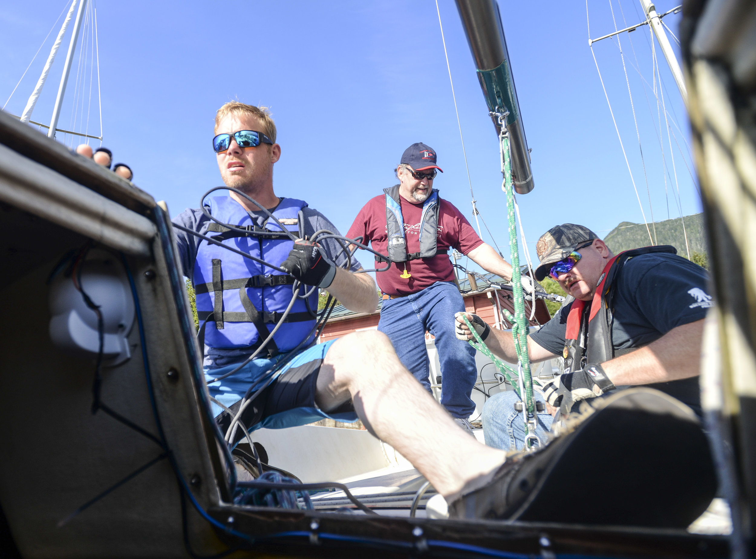  Race To Alaska Team Ketchikan members Mike Fiari, left, Charley Starr, middle, and Tom Logan work to get Kermit, their Santa Cruz 27, out of Thomas Basin harbor on Tuesday, June 7, 2016. ©Ketchikan Daily News 