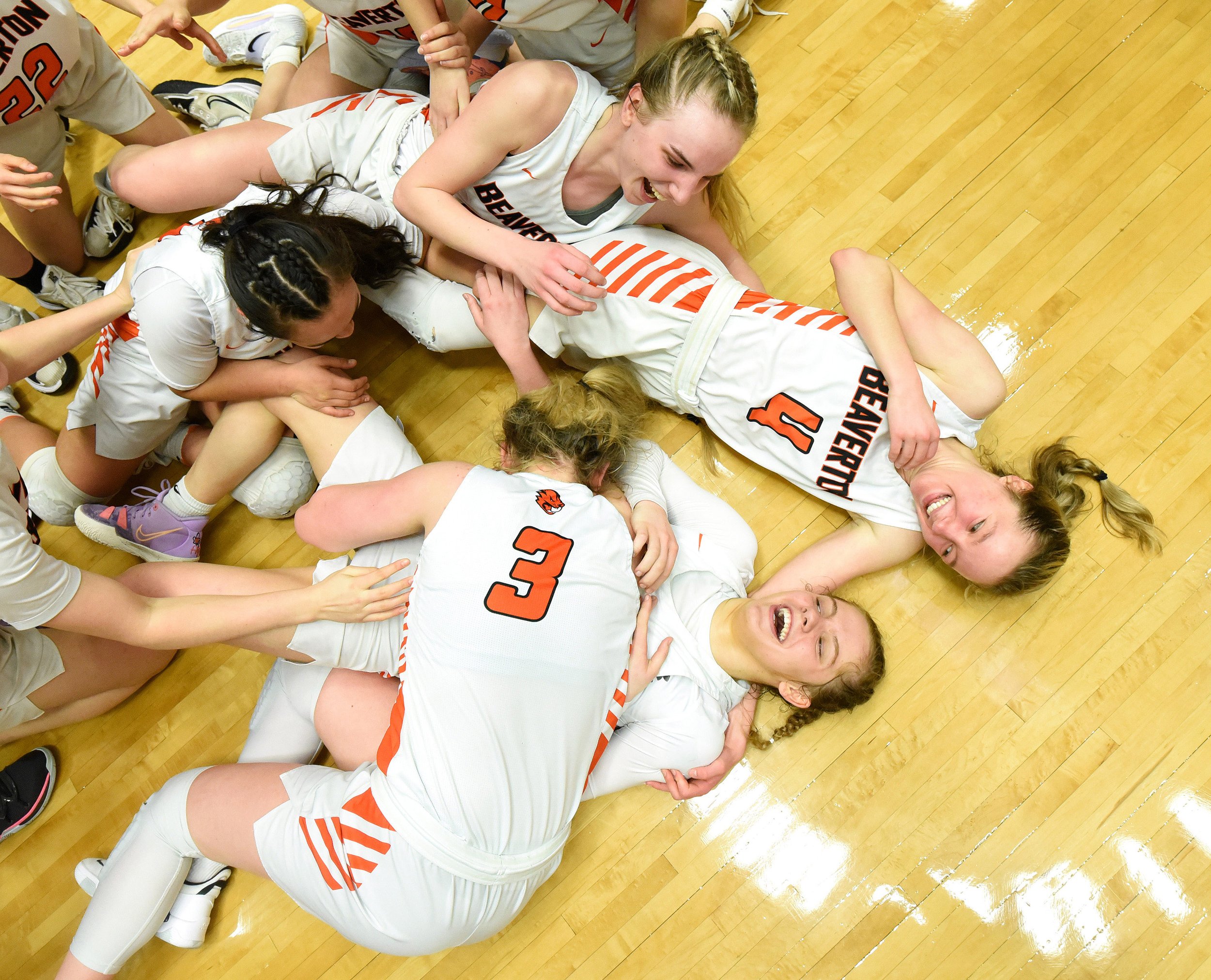   2022 NPPA Monthly News Clip Contest 2nd Place   Beaverton High School players celebrate Saturday, March 12, 2022, after defeating Barlow 56-39 in the 6A OSAA State Basketball Championship at the Chiles Center at the University of Portland in Portla