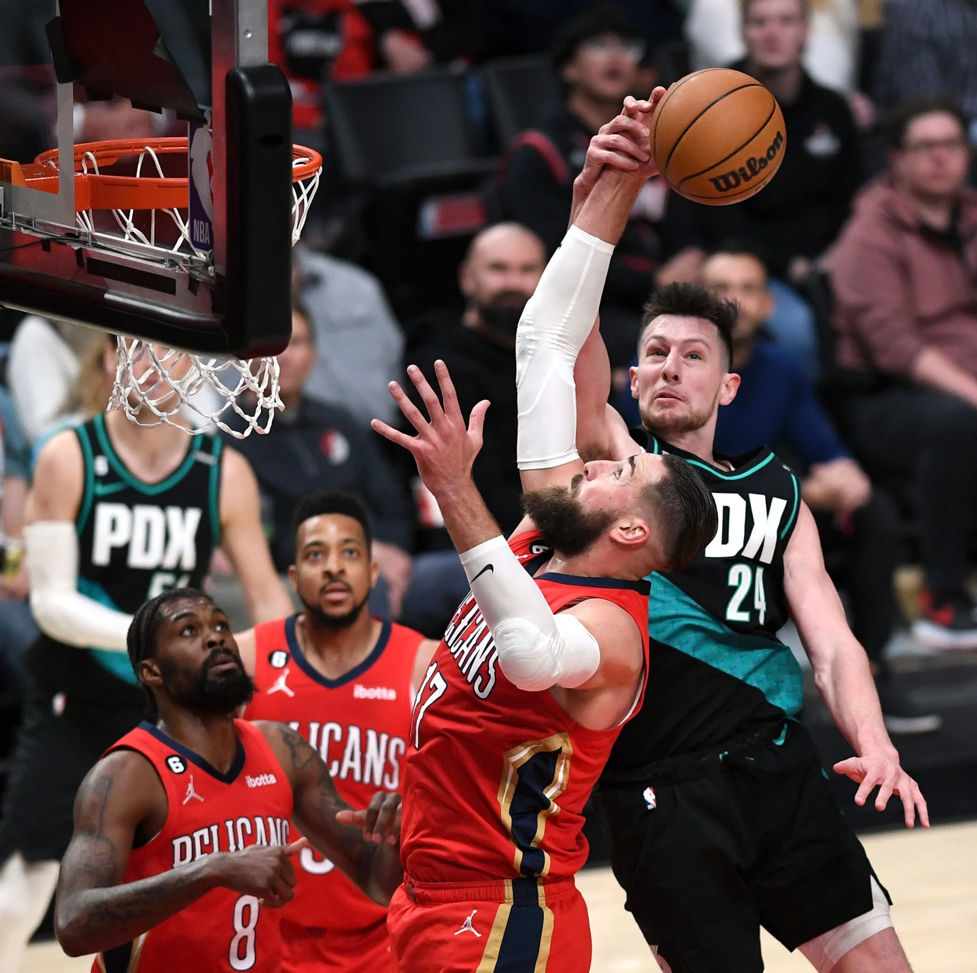  Portland center Drew Eubanks, right, has his shot broken up by New Orleans center Jonas Valančiūnas on Monday, March 27, 2023, during the Trail Blazers’ 124-90 loss to the Pelicans at Moda Center. 