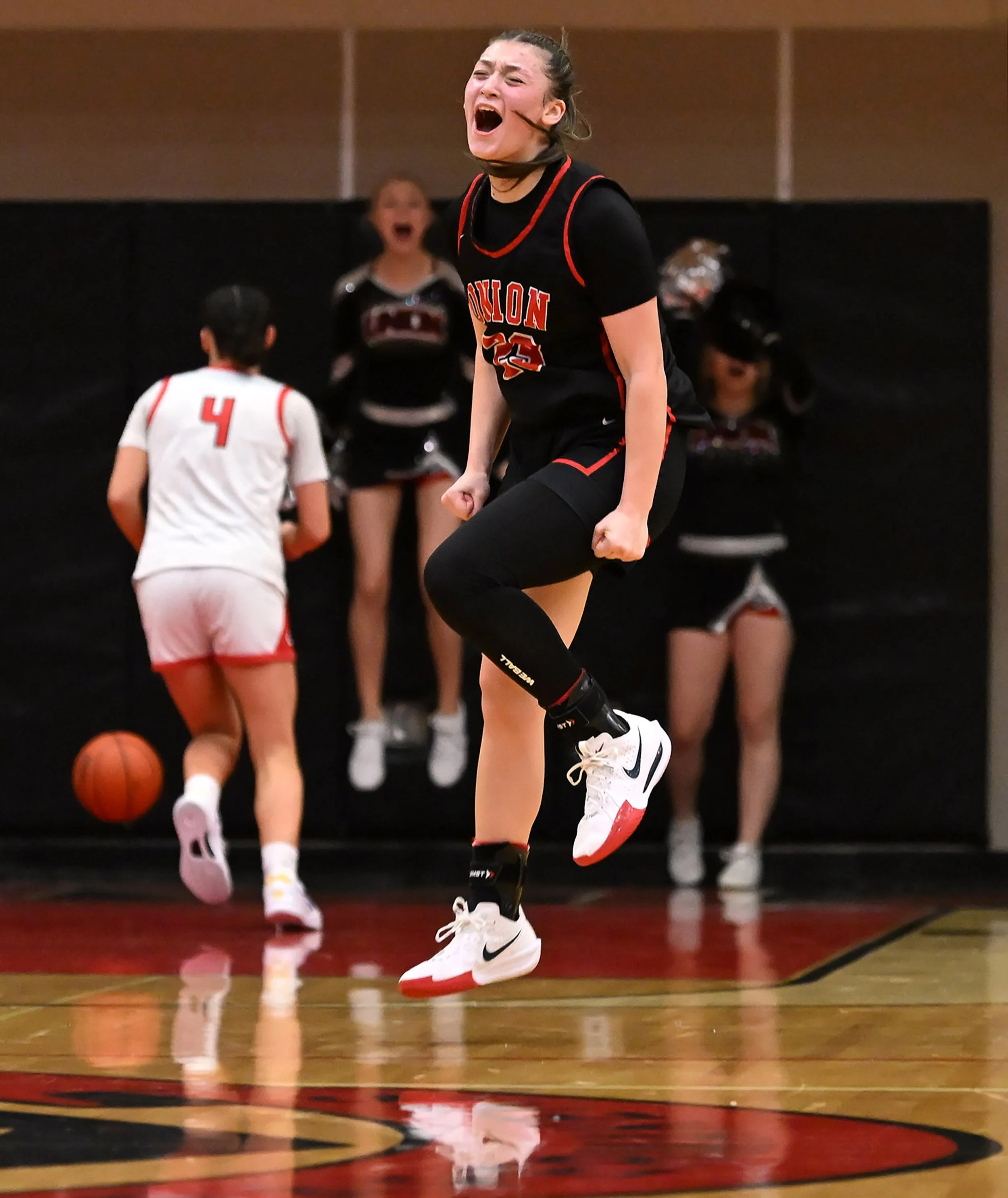   NPPA Monthly News Clip Contest 1st Place    Union junior Brooklynn Haywood celebrates a made three Friday, Jan. 10, 2025, during the Titans’ 71-69 loss to Camas at Camas High School. 