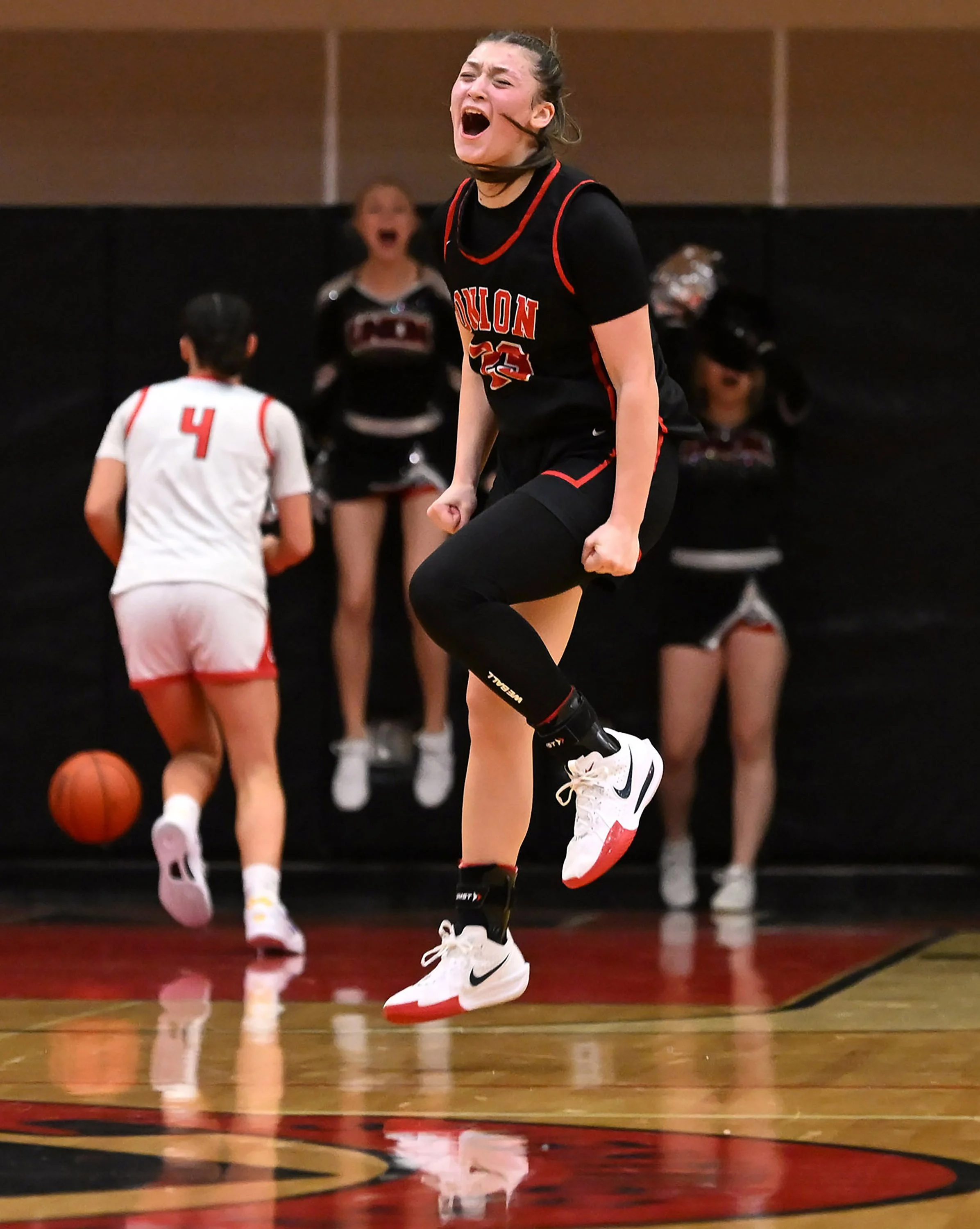  Union junior Brooklynn Haywood celebrates a made three Friday, Jan. 10, 2025, during the Titans’ 71-69 loss to Camas at Camas High School. 
