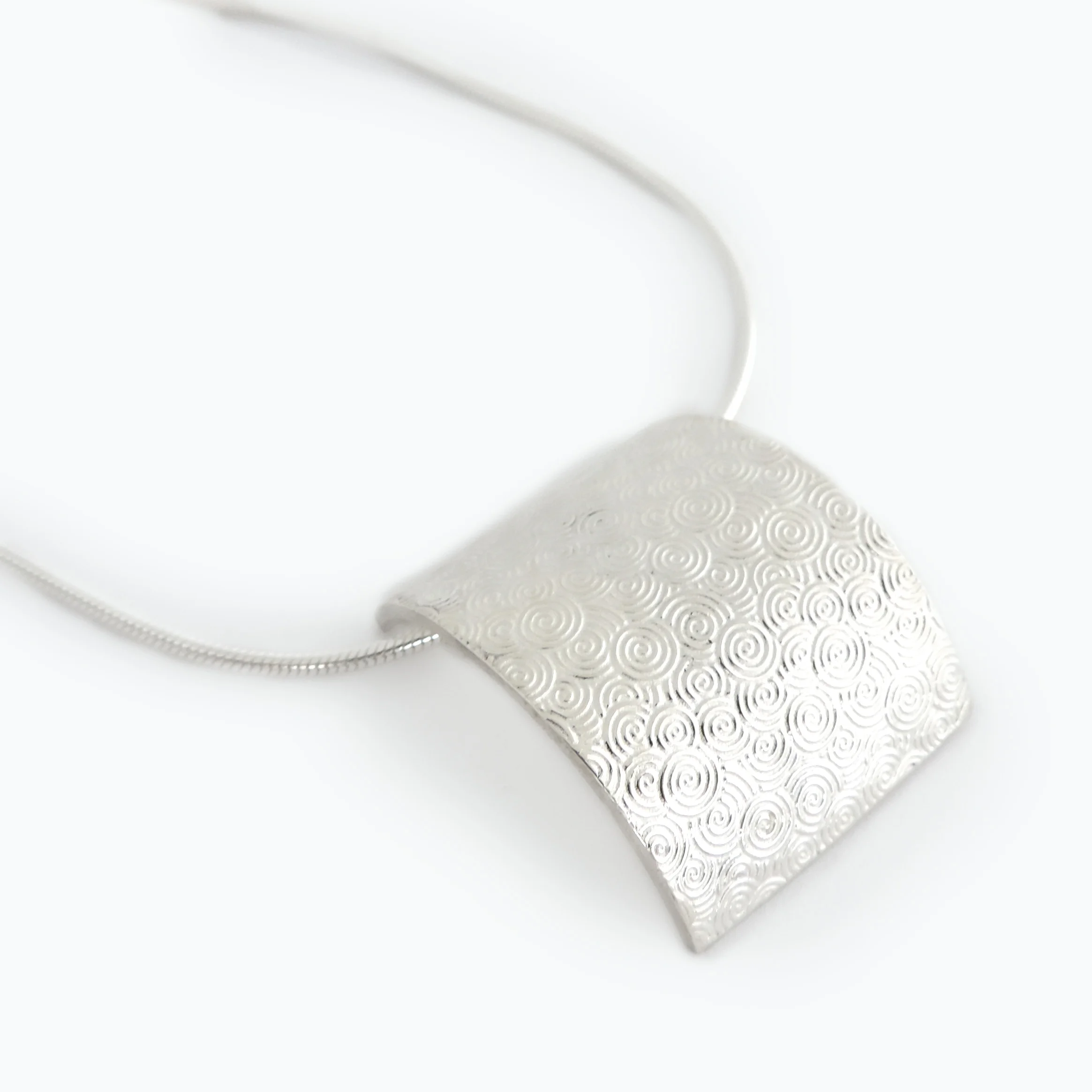 swirltexarcpendant.jpg