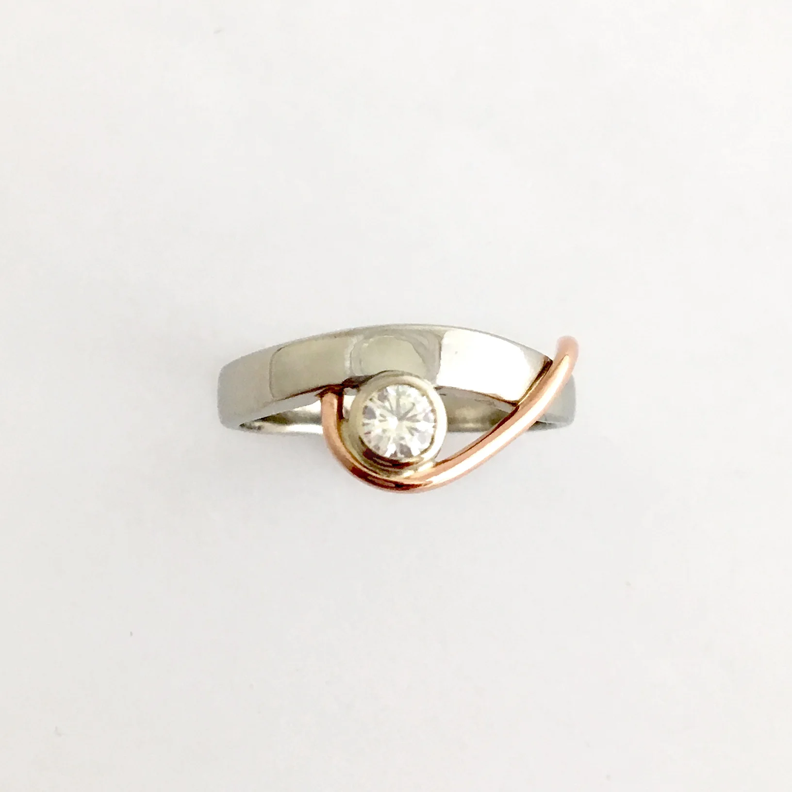 White and rose gold diamond engagement ring
