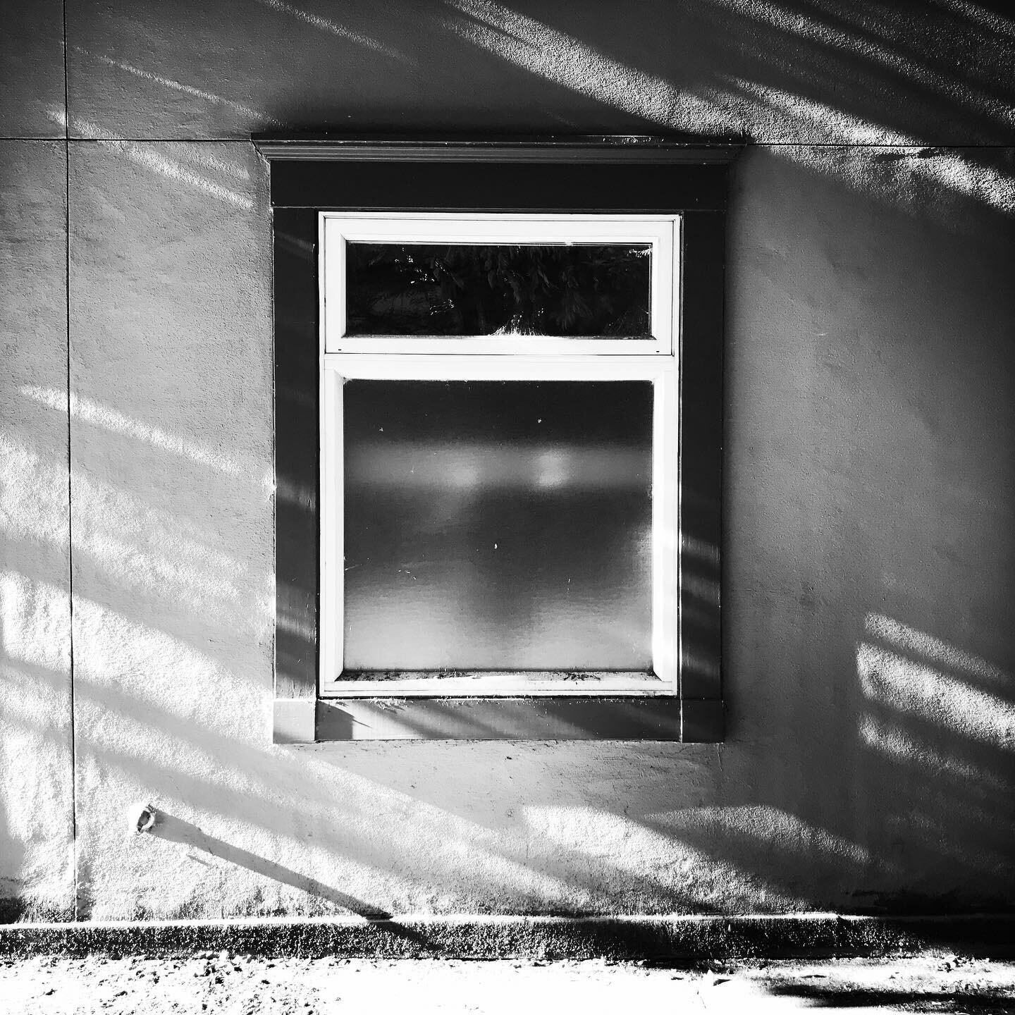 NW Thurman Street, Afternoon. #bwphotograpy #blackandwhite #streetphotography #shadows #summer #window