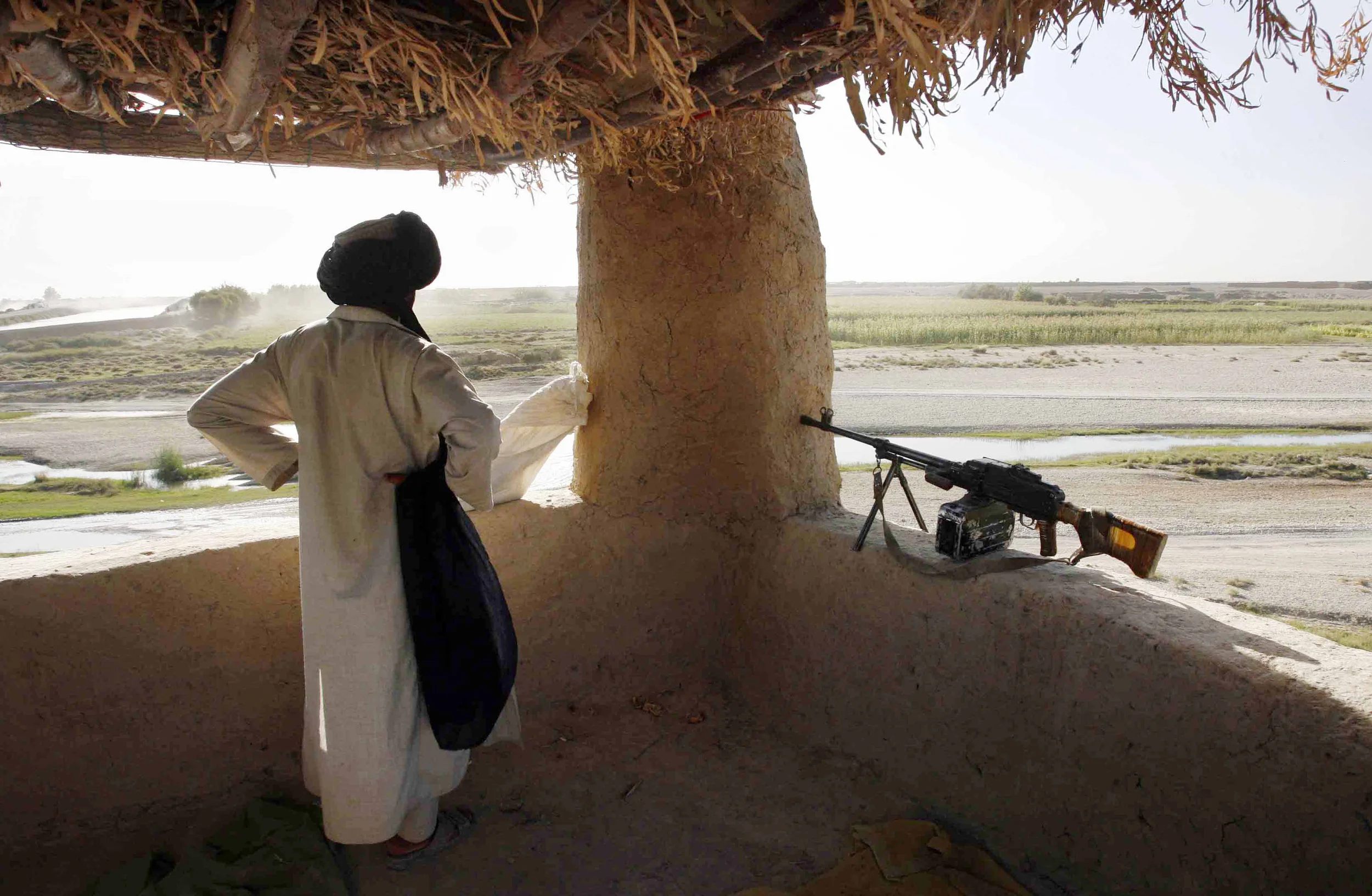 An Afghan policeman on duty in Gereshk, Afghanistan, 2007.