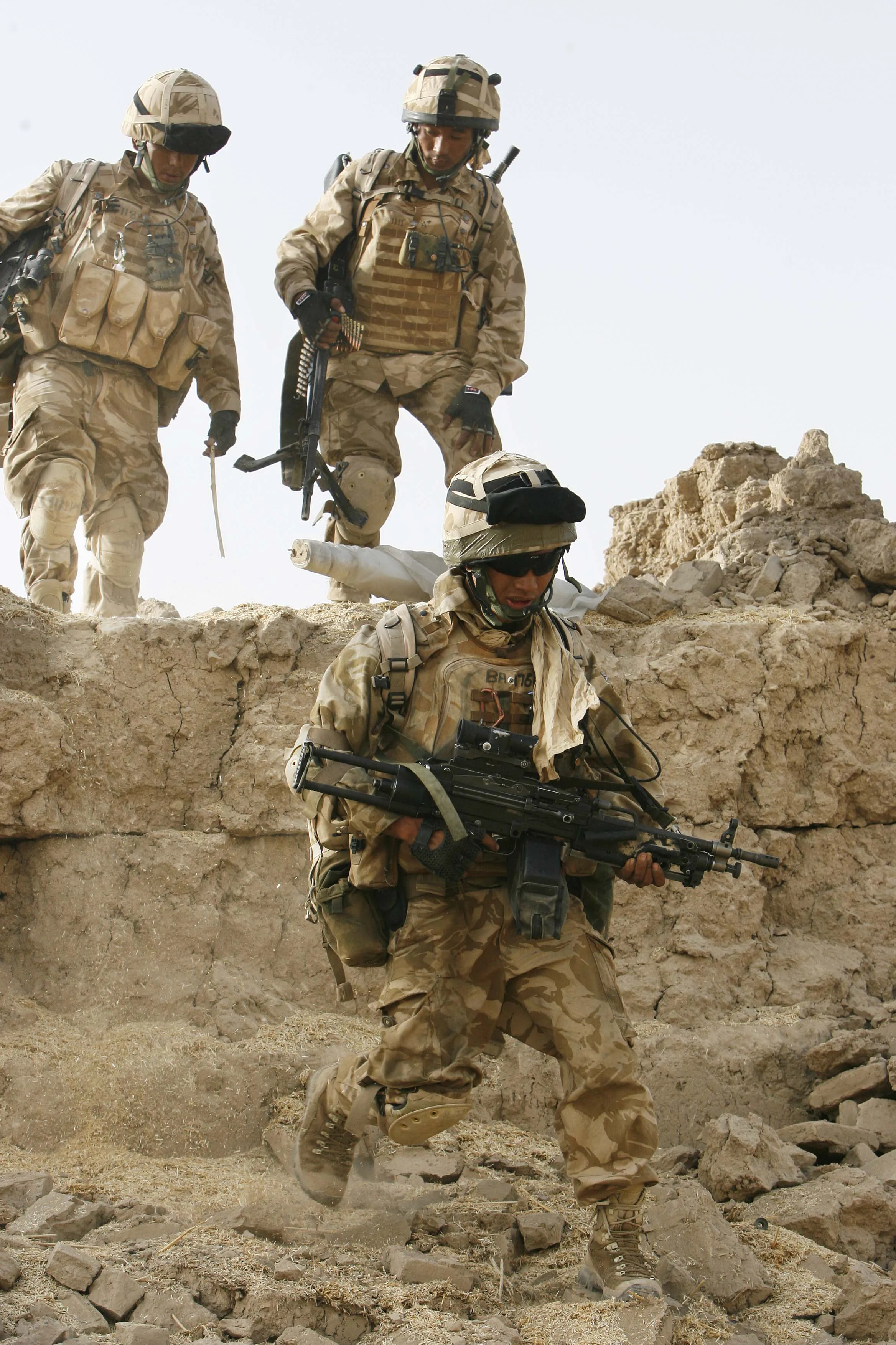 The Royal Gurkha Rifles of 'C' company, clearing a compound believed to have been used by Taleban, in the 'Green Zone' area of Hydarabad, Helmand Province, Afghanistan. September, 2007.