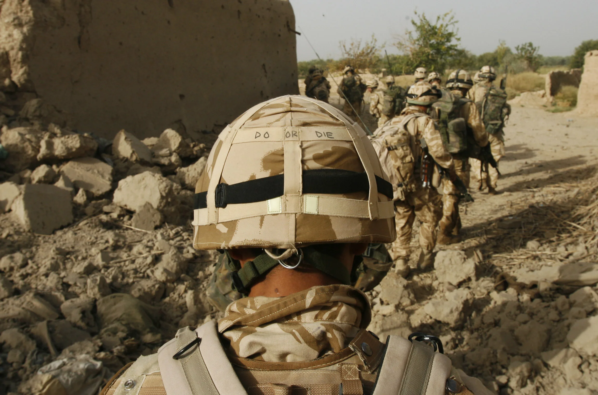 The Royal Gurkha Rifles of 'C' company, clearing a compound believed to have been used by Taleban, in the 'Green Zone' area of Hydarabad, Helmand Province, Afghanistan. September, 2007.