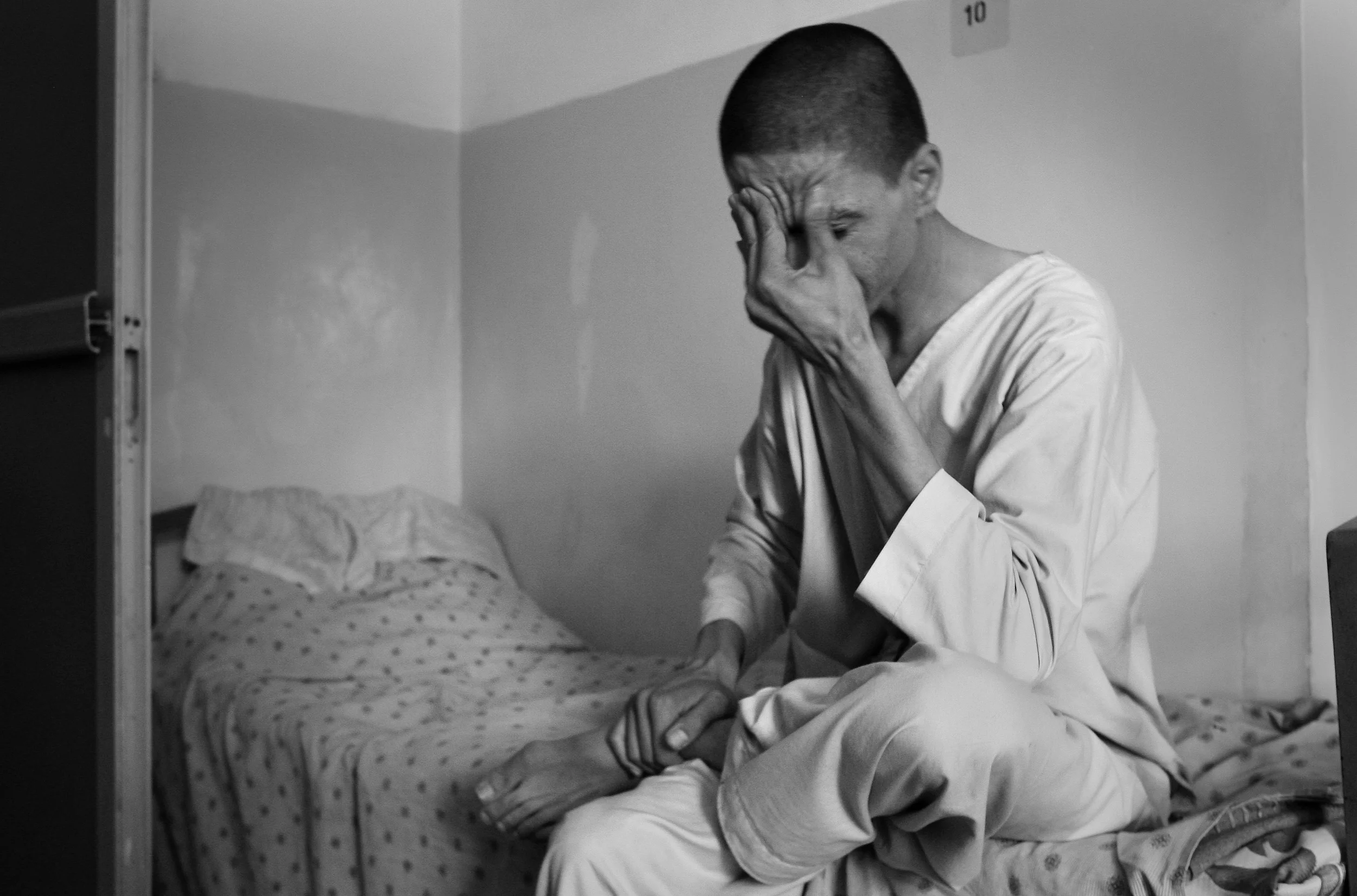  Recovering drug addict and former soldier, 'Massoud' in the Nejat clinic in Kabul, Afghanistan, where he is being cured of his addiction. September, 2009. 