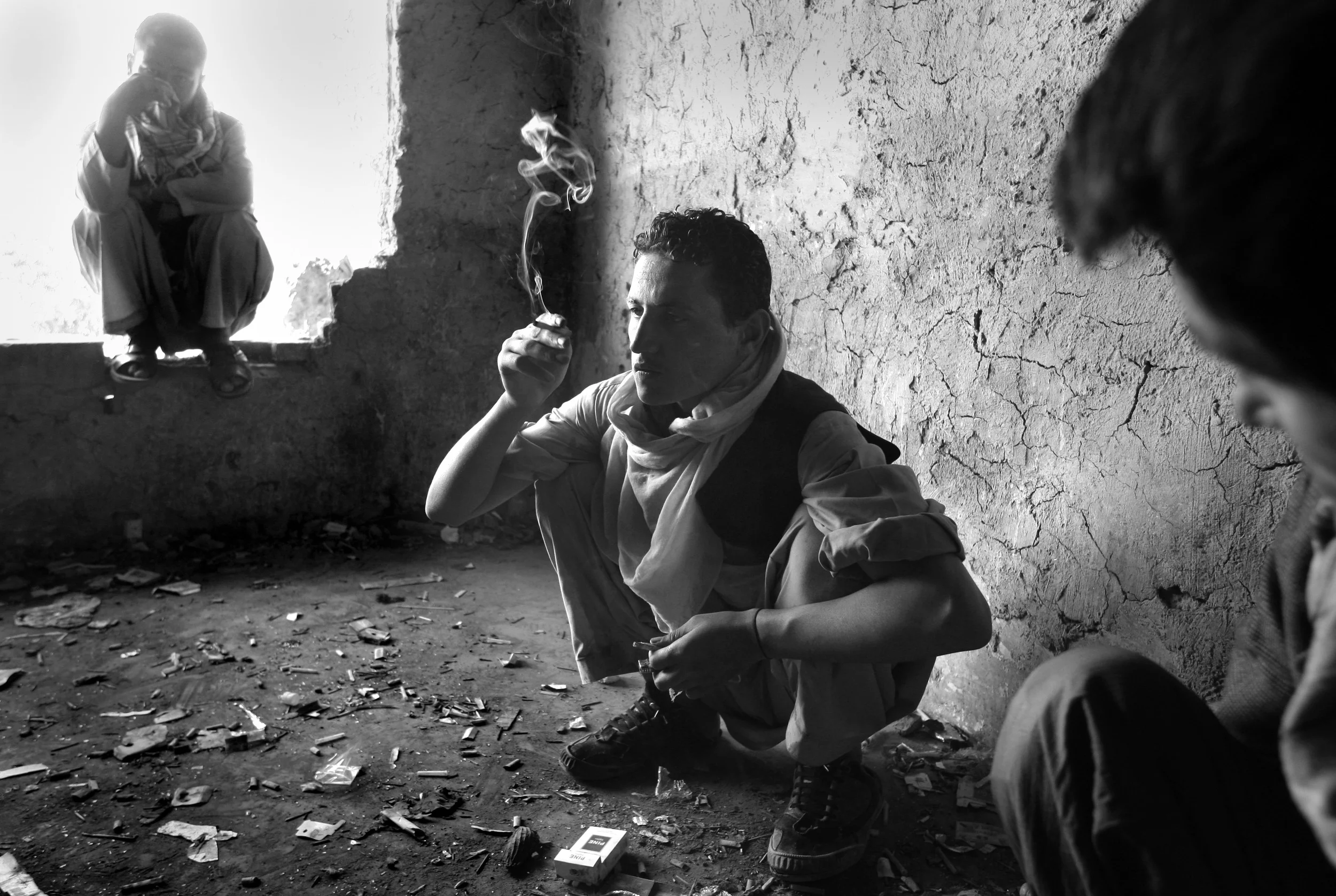  Drug users in the destroyed, former Russian Cultural Centre, a haven for drug addicts in Kabul, Afghanistan. September, 2009. 