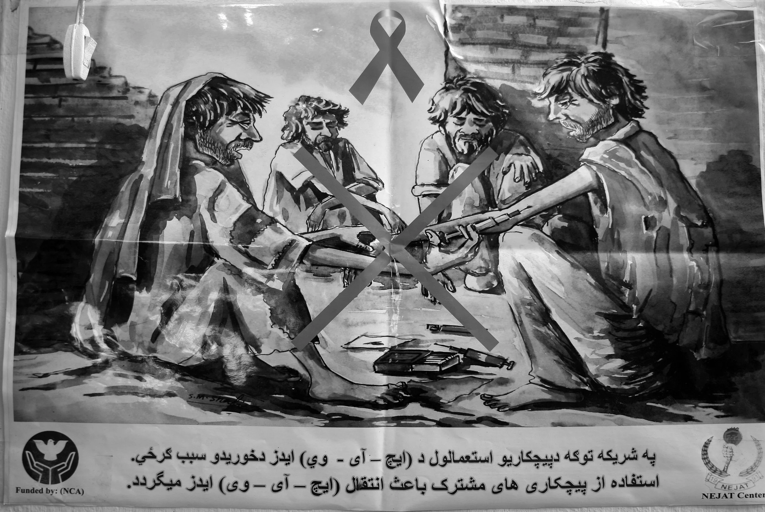  A poster warning drug users of the dangers of drug abuse, found in the NEJAT clinic for recovering addicts in Kabul, Afghanistan. September, 2009. 