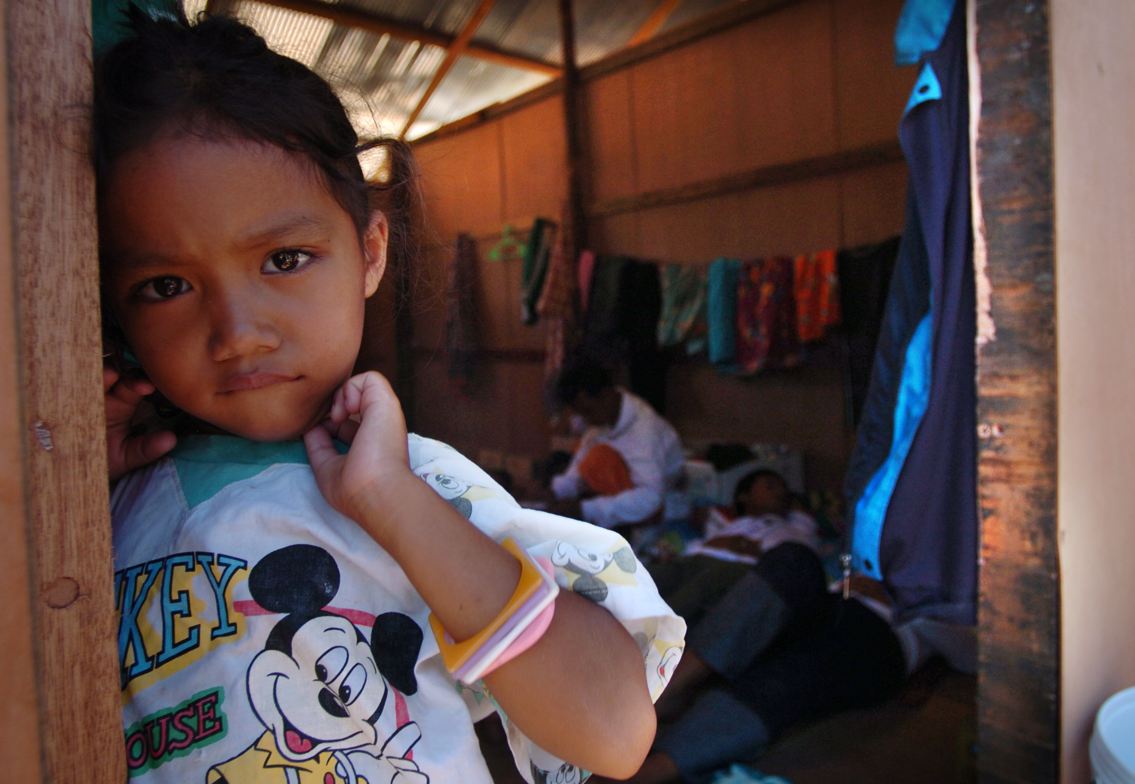  A child at her temporary shelter after her village was washed away by the Asian tsunami, Khao Lak, thailand, 2005. 