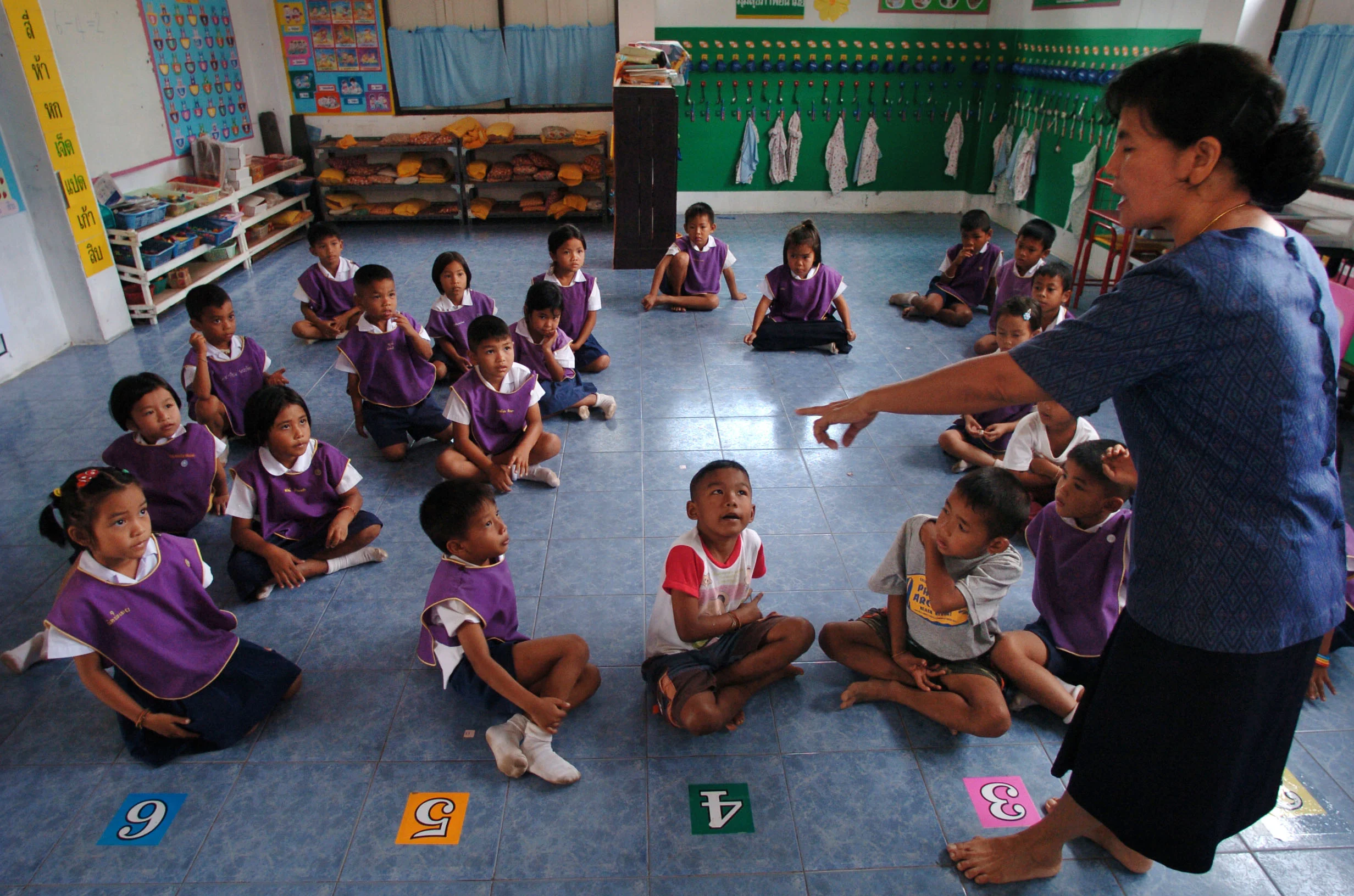  Spaces on the floor of a school room of some of the children missing following the Christmas 2004 Asian tsunami. Khao Lak, Thailand 2005 