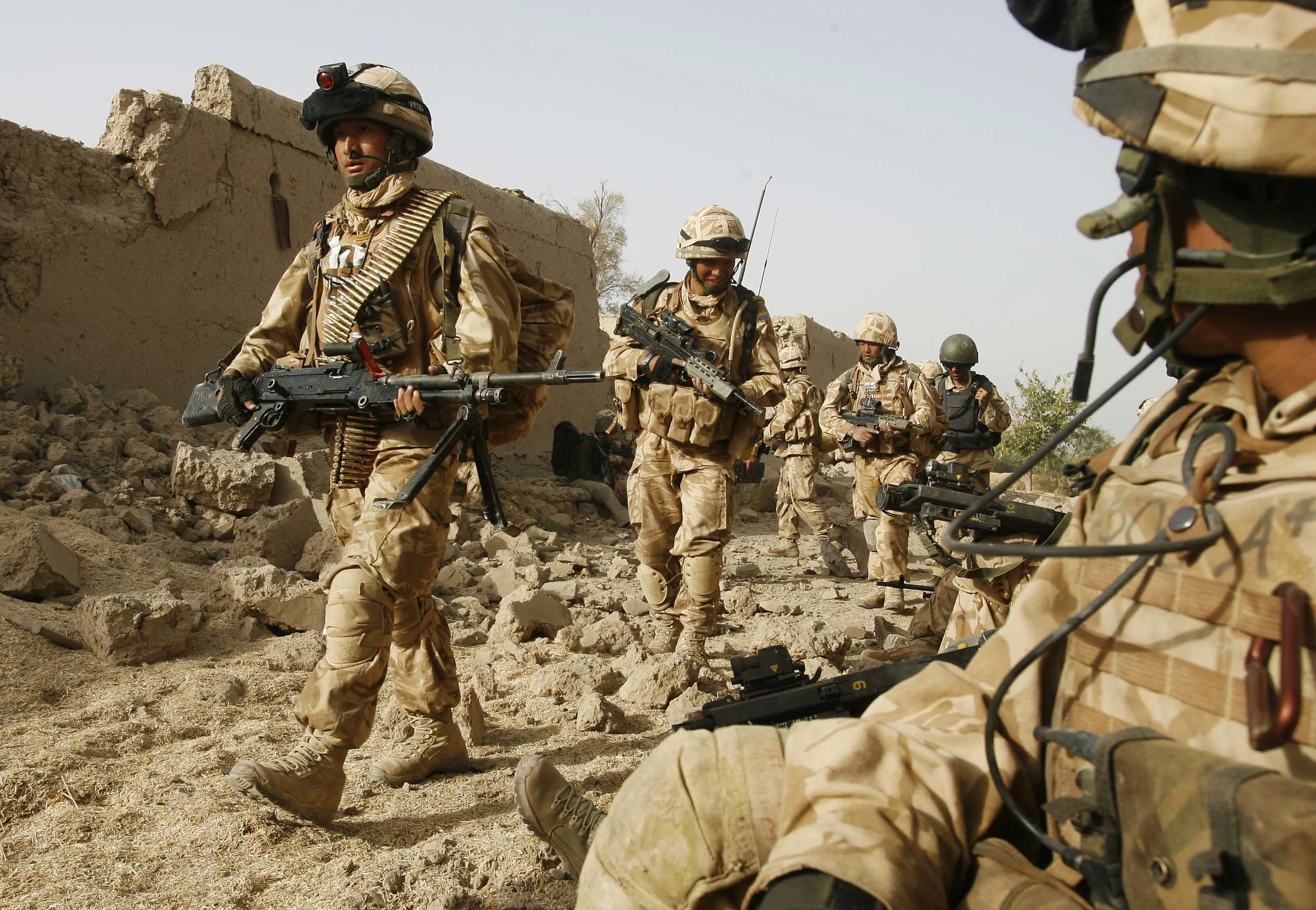  The Royal Gurkha Rifles of 'C' company, clearing a compound believed to have been used by Taleban, in the 'Green Zone' area of Hydarabad, Helmand Province, Afghanistan. September, 2007. 