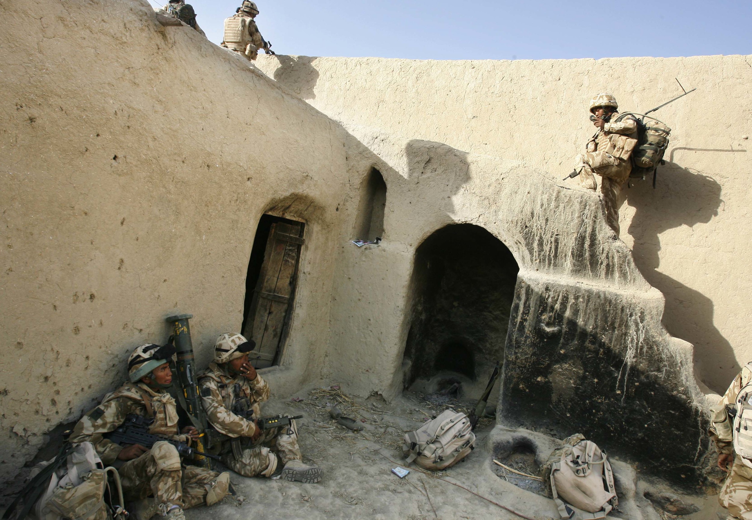  The Royal Gurkha Rifles of 'C' company, clearing a compound believed to have been used by Taleban, in the 'Green Zone' area of Hydarabad, Helmand Province, Afghanistan. September, 2007. 