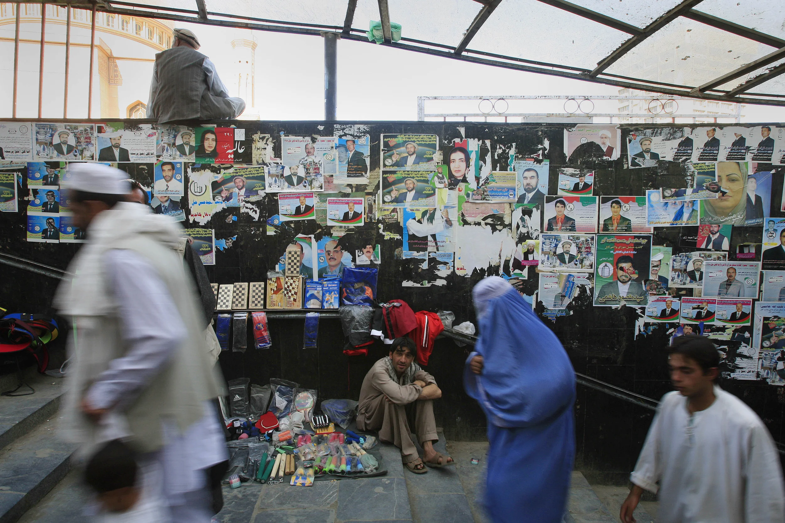  Election posters plastered to the walls of a subway in central Kabul, Afghanistan, 2009. 