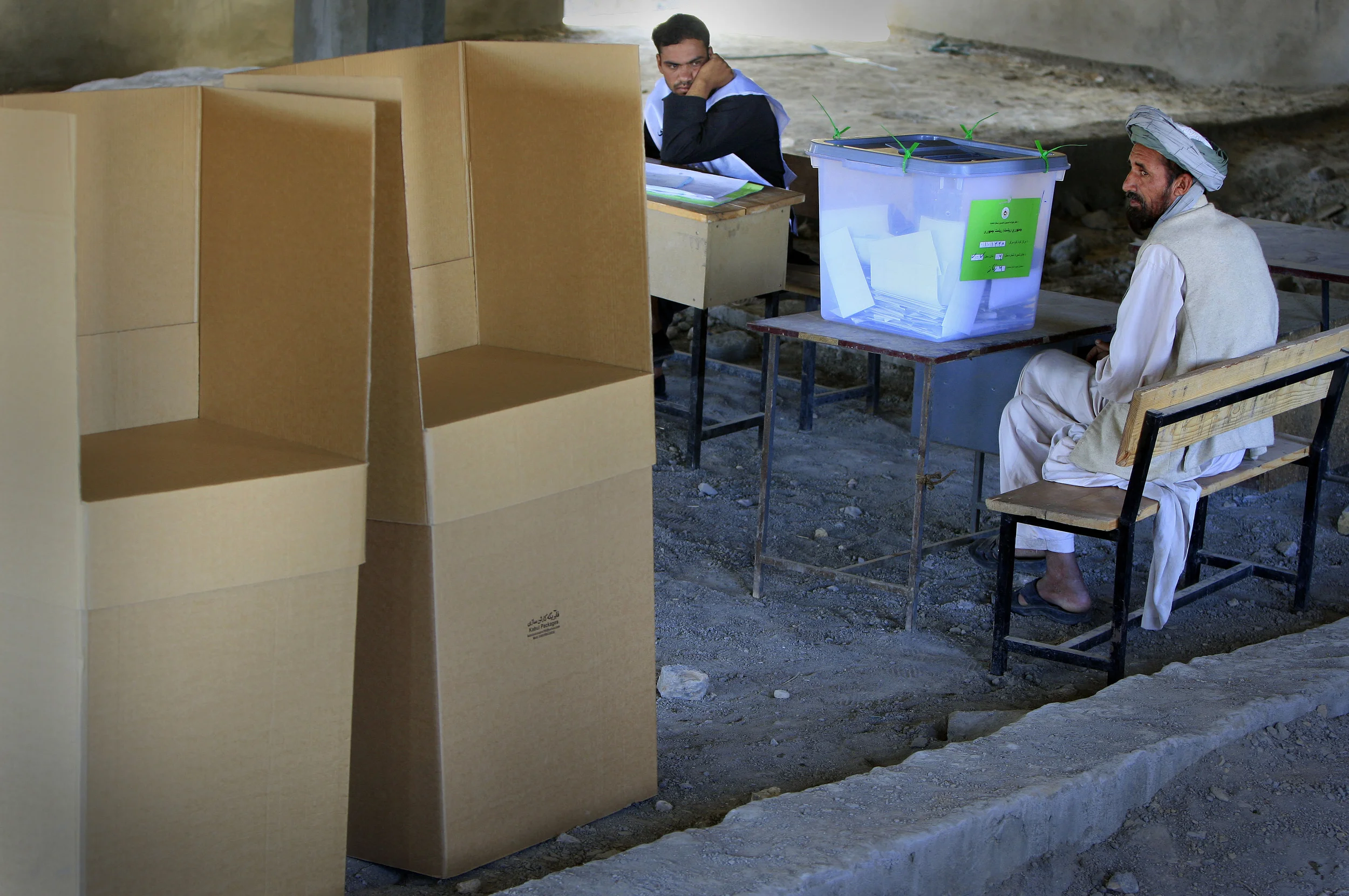  'Stuffed' ballot boxes at a deserted polling station in Pul-e-Charki, Kabul province, Afghanistan, 2009. 