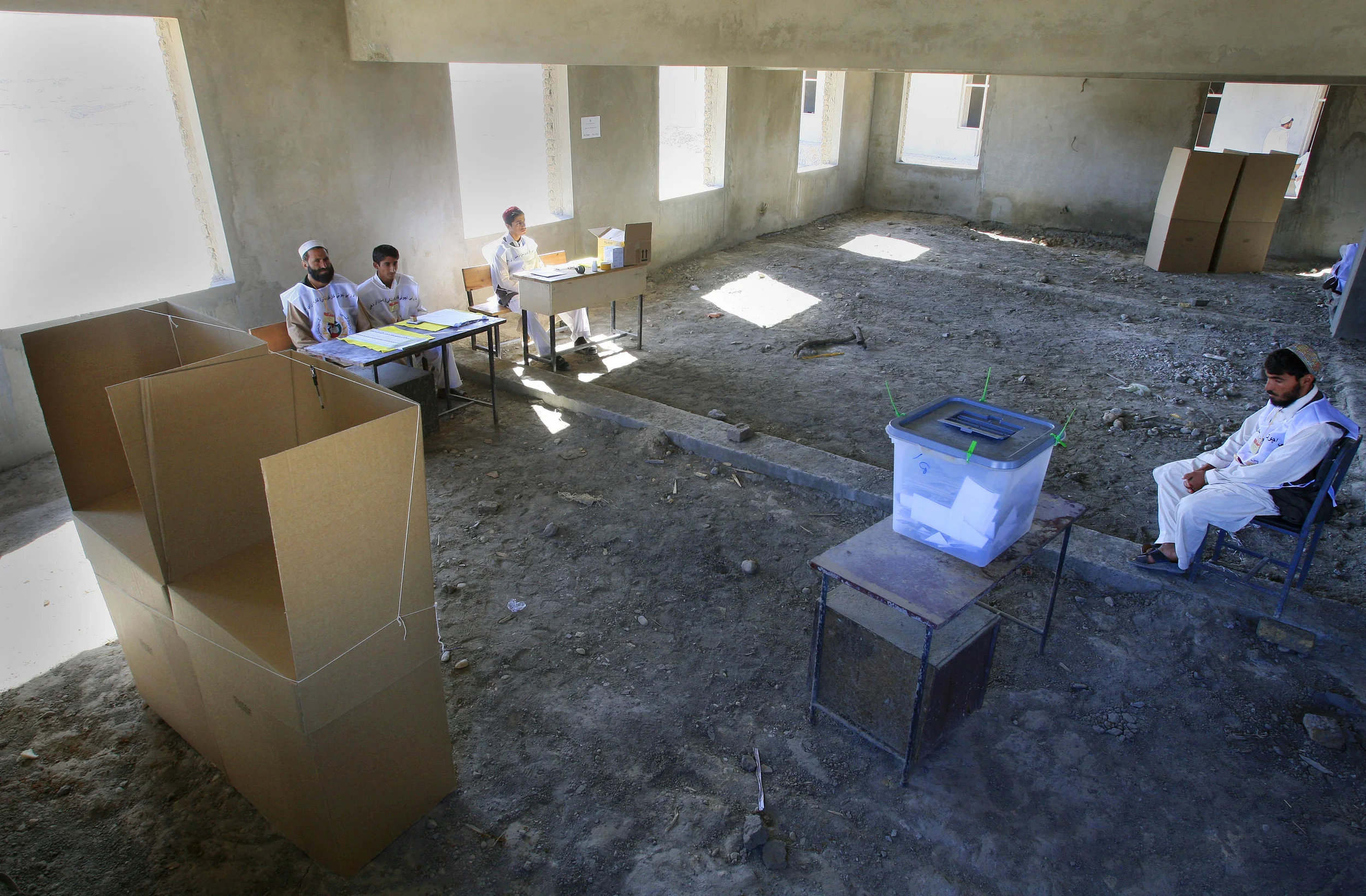  'Stuffed' ballot boxes at a deserted polling station in Pul-e-Charki, Kabul province, Afghanistan, 2009. 