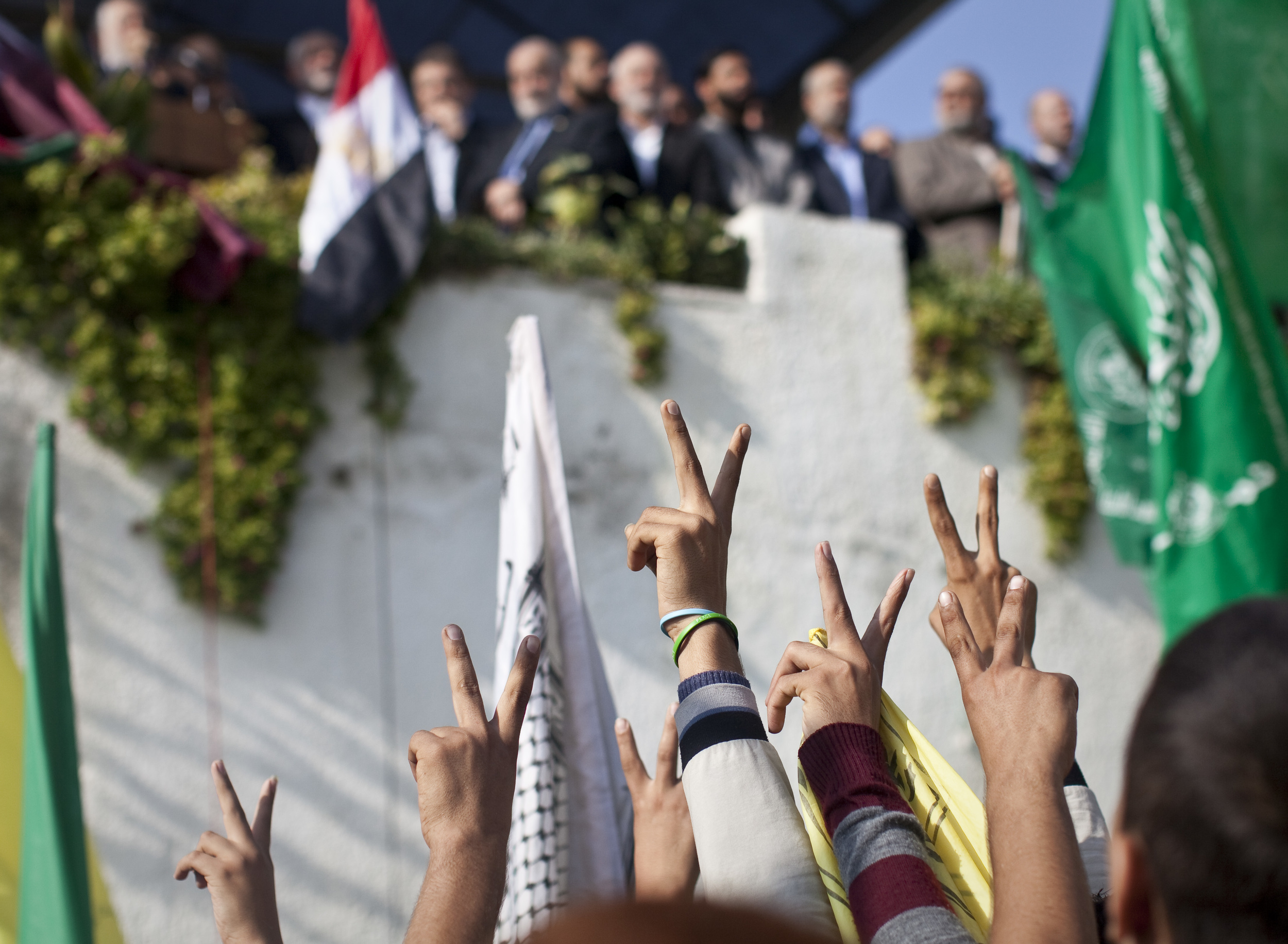  Palestinians show their support for the senior members of Hamas at a rally in Gaza City, the day after a ceasefire was negotiated with Israel. December 2012. 