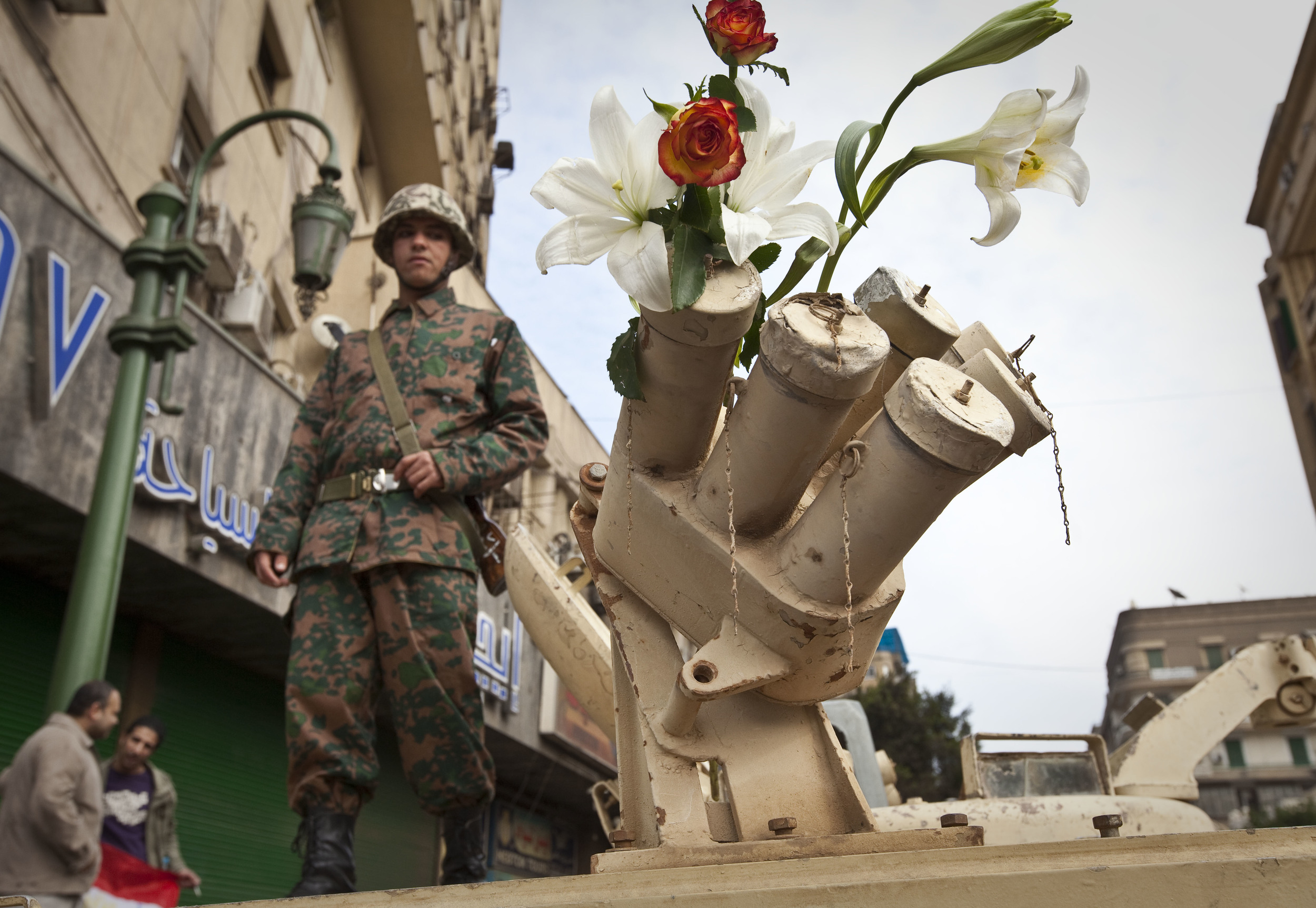  Neutral Egyptian Army soldiers try to keep the peace between pro and anti Mubarak protesters, Tahrir square, Cairo, 2011. 