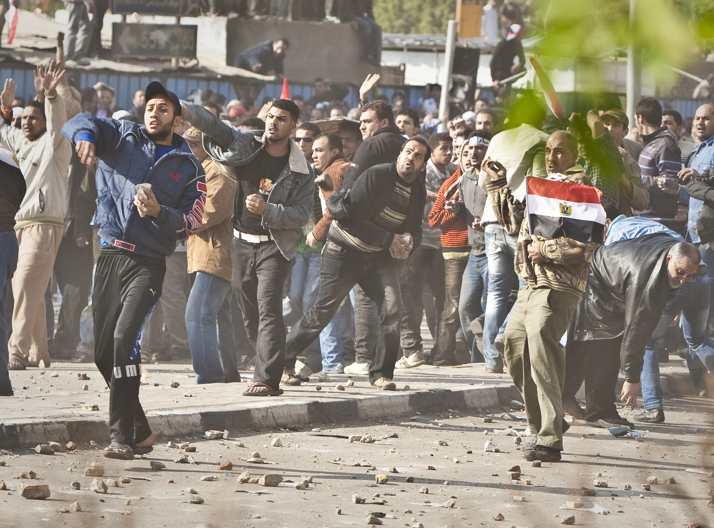  Pro Hosni Mubarak rioters pelt their opponents with bricks and concrete as riots flared in Tahrir square, Cairo, 2011. 