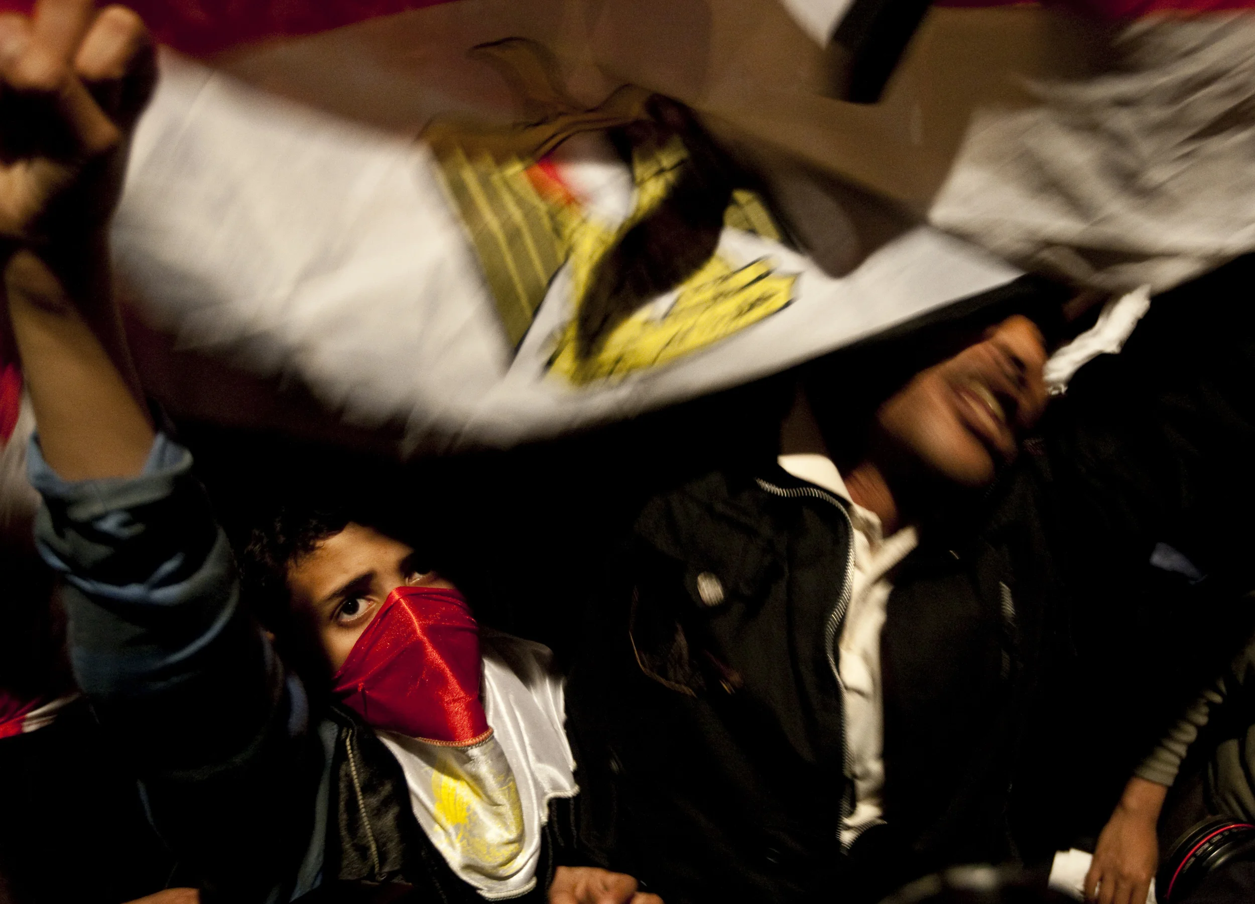  Anti Mubarak protesters in Tahrir square demonstrate prior to a night-time speech from their president, Cairo, 2011 