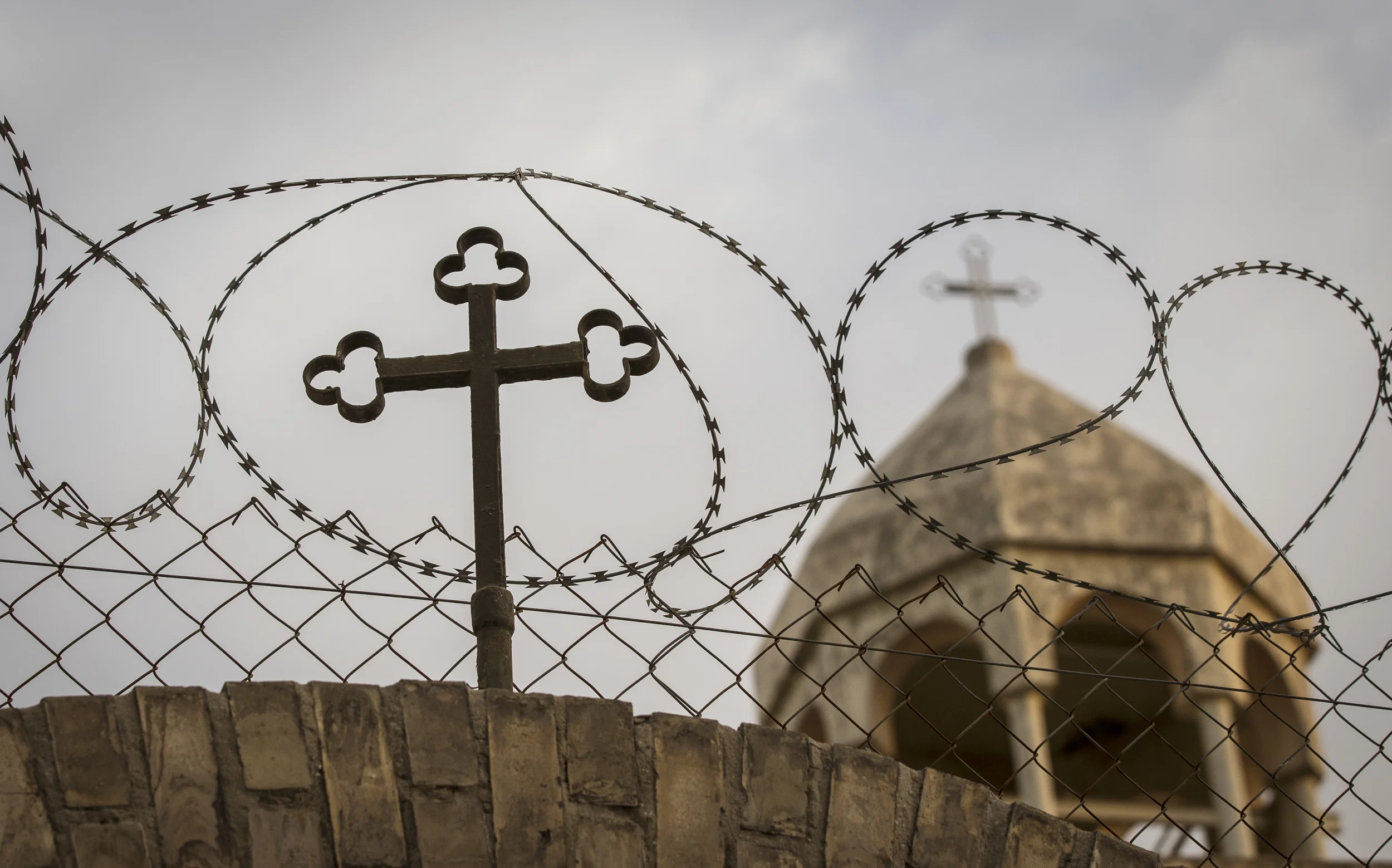  Razor wire forms part of the security protecting the 'Sacred Heart' church in Baghdad, Iraq. The Christian population of Iraq has depleted dramatically in the past decade, many fleeing the country. March 2013. 