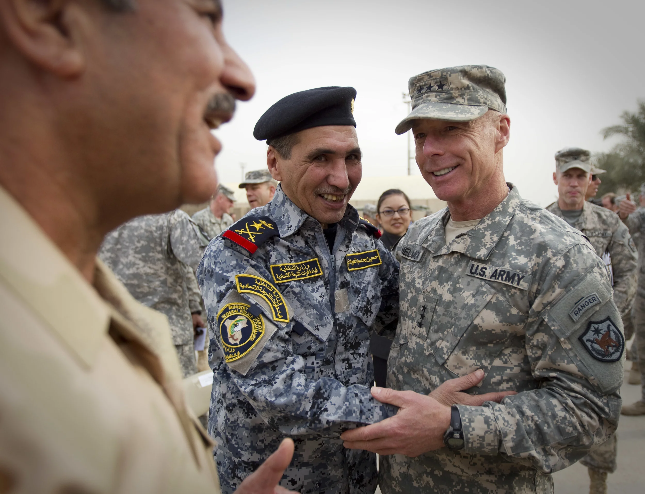  U.S. General Frank Helmick, right, the second most senior officer in Iraq, in good spirits with Iraqi Generals following the ceremony marking the Americans end of mission in Iraq. Baghdad airport December 2011. 