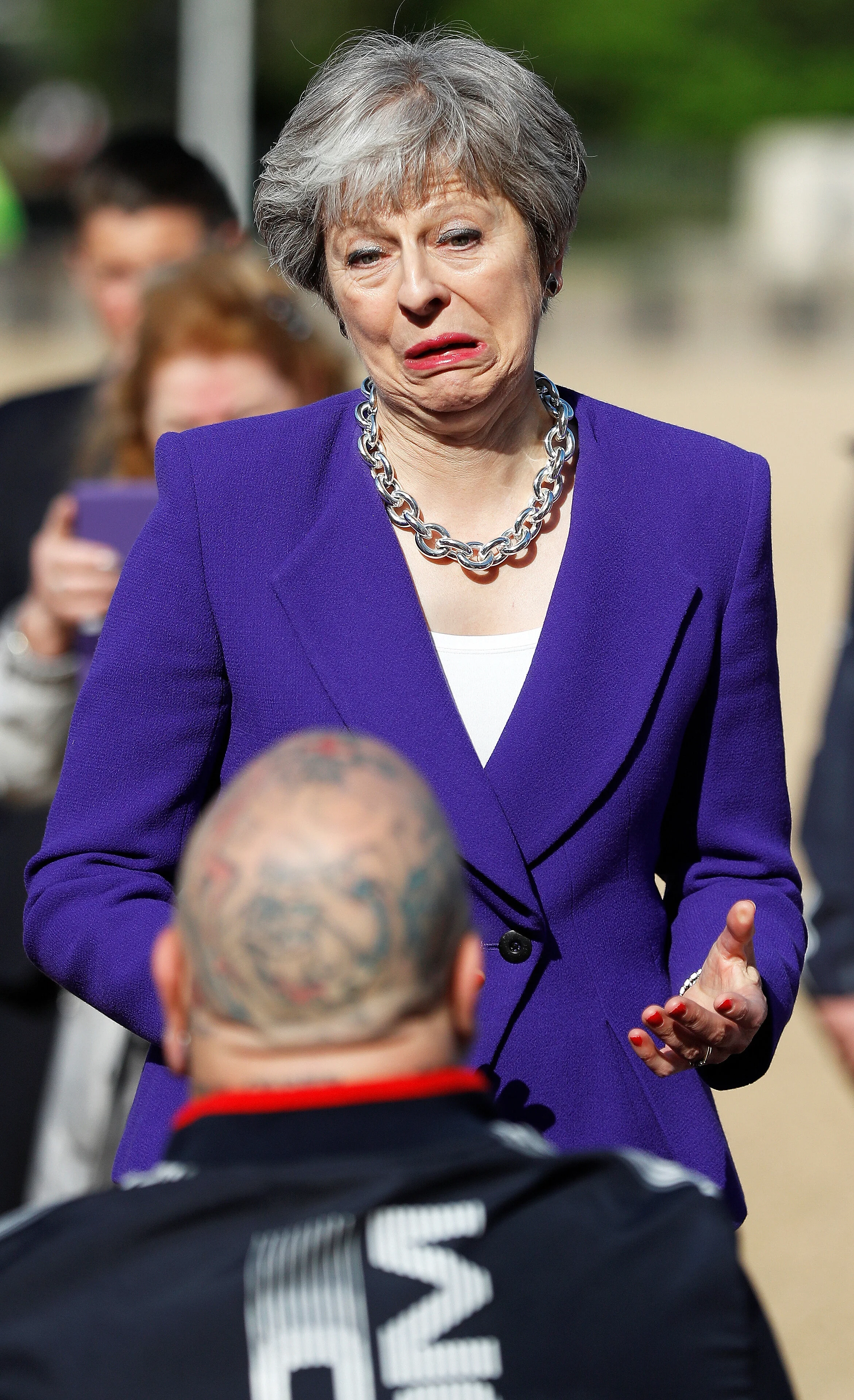 Britain's Prime Minister Theresa May reacts as she meets members of the United Kingdom's Invictus Games team on Horse Guards Parade in central London, May 15, 2018 