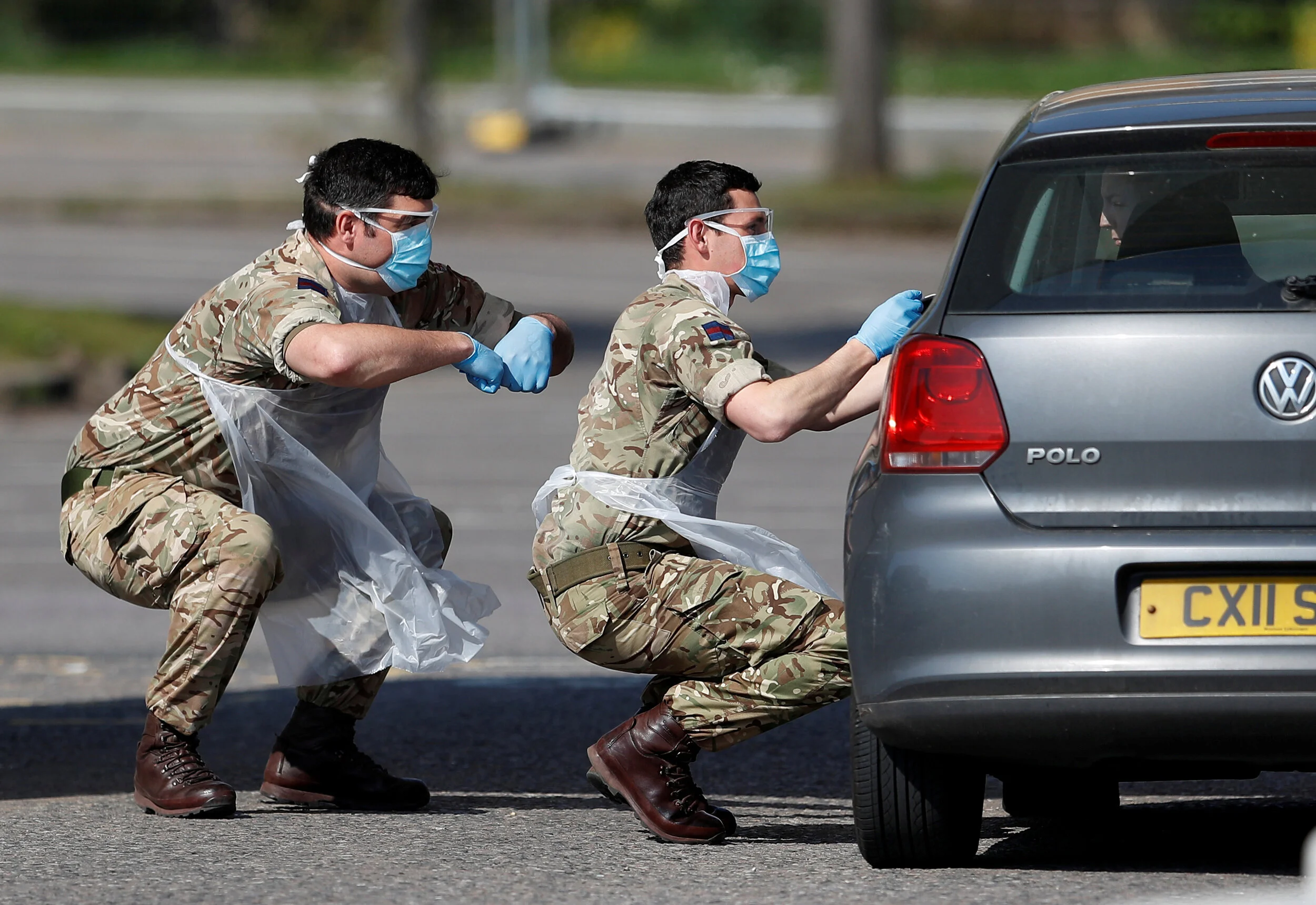  Military personnel are seen testing people at a coronavirus test centre in the car park of Chessington World of Adventures as the spread of the coronavirus disease (COVID-19) continues, in London, Britain, April 10, 2020 