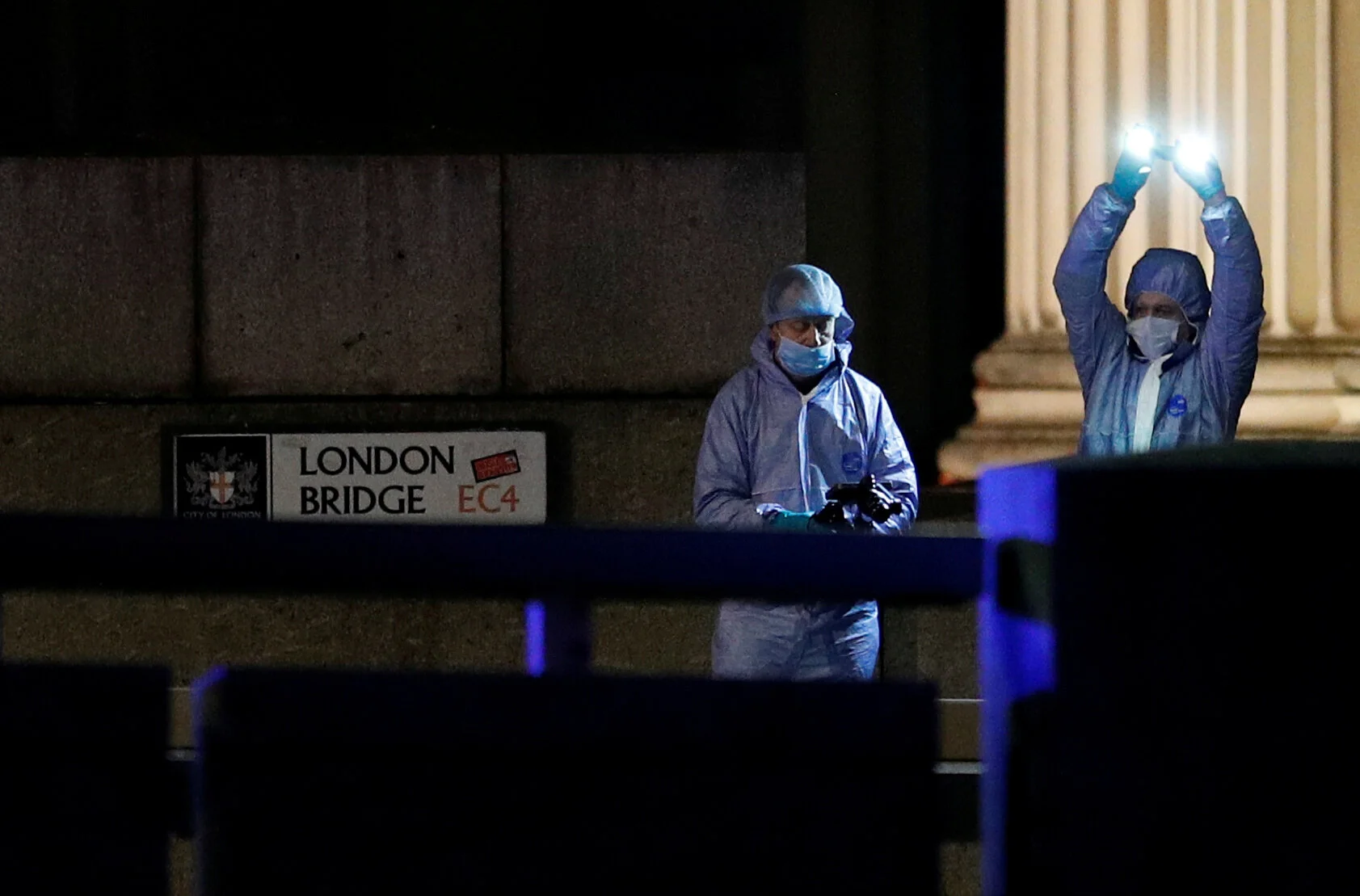  Forensics officers are seen near the site of an incident at London Bridge in London, Britain, November 29, 2019 