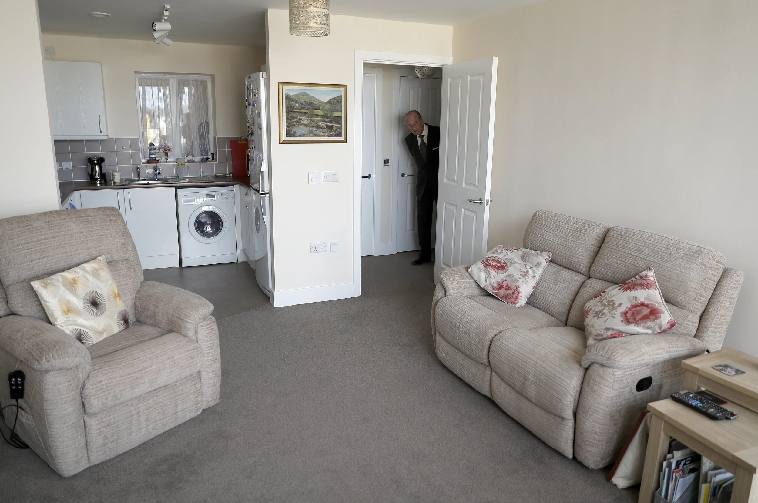  Britain's Prince Philip arrives to view a flat during a visit with Queen Elizabeth to Priory View, an independent living scheme for older residents, in Dunstable, Britain, April 11, 2017.  