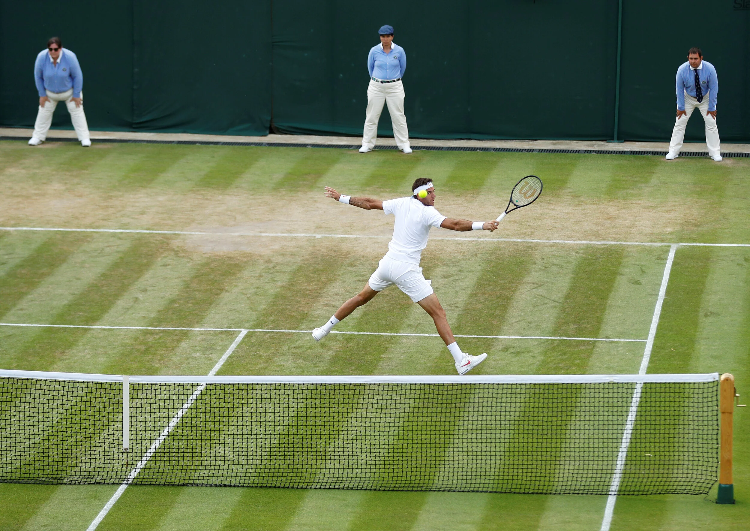  Argentina's Juan Martin Del Potro in action during the fourth round match against France's Gilles Simon. Wimbledon - All England Lawn Tennis and Croquet Club, London, Britain - July 9, 2018. 