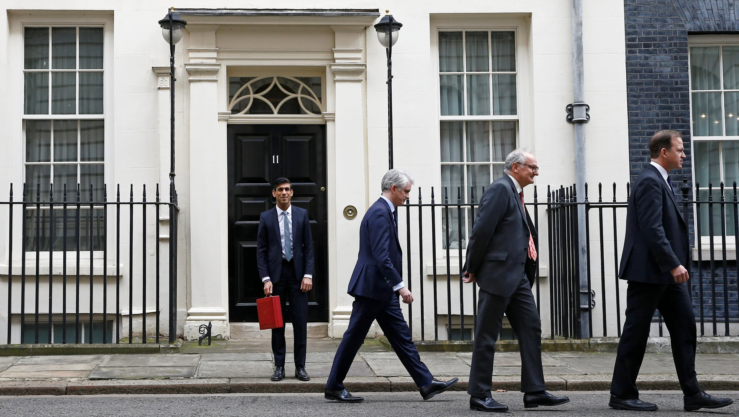 Britain's Chancellor of the Exchequer Rishi Sunak holds the red budget box outside his office in Downing Street in London, Britain March 11, 2020 