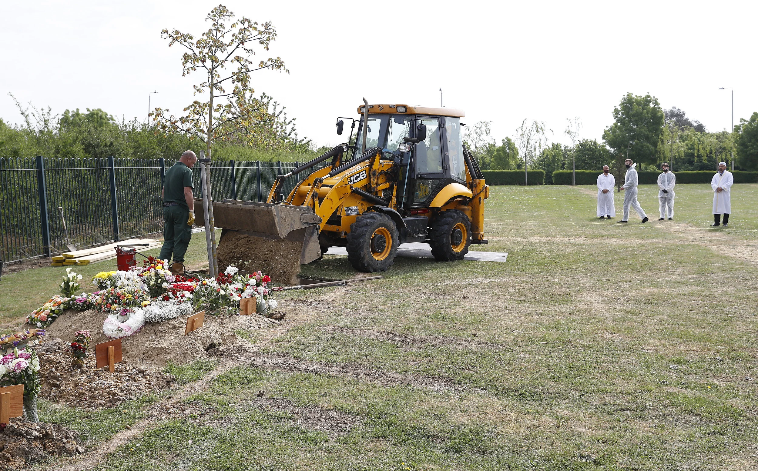  The funeral of COVID-19 victim Ozcan Aygin takes place at Chadwell Heath cemetery as the spread of the coronavirus disease (COVID-19) continues, in Romford, Britain, April 27, 2020 