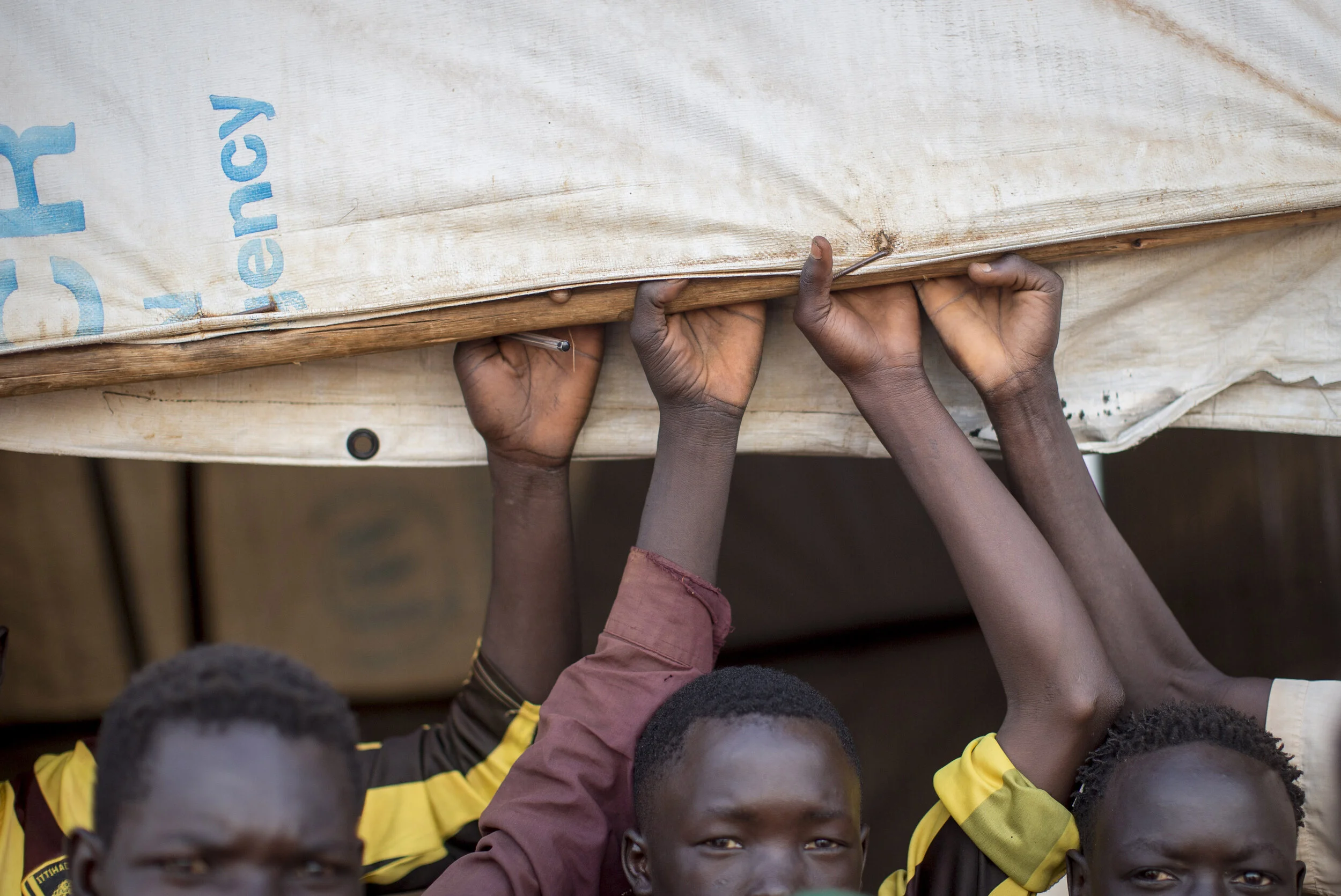  Sudanese refugees at the Bambasi refugee camp, near Asosa, Ethiopia, wait at the food collection centre there. November 7, 2014 