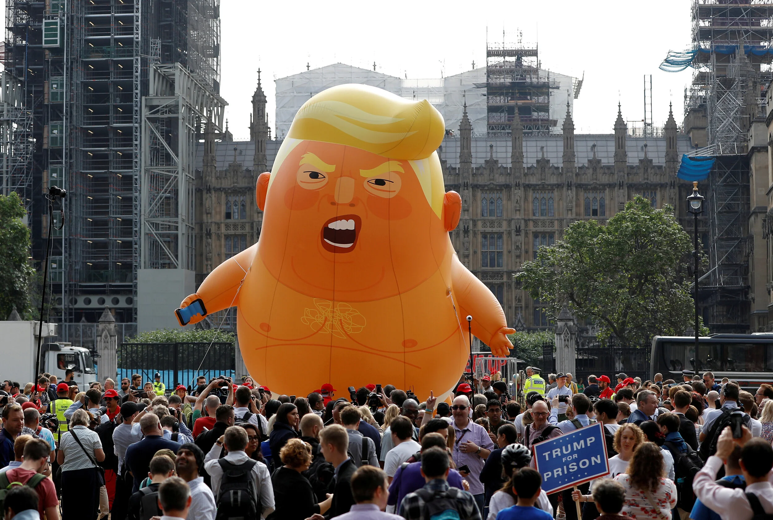  Demonstrators fly a blimp portraying U.S. President Donald Trump, in Parliament Square, during the visit by Trump and first lady Melania Trump in London, Britain, July 13, 2018. 