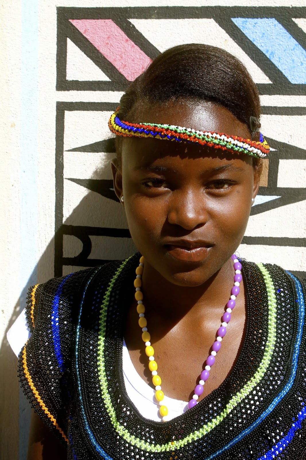 This is one of my grade eight learners, Maria. We went on field trip with the school choir to the Ndebele king’s wedding. The choir waited around for hours to sing, but never got the chance. Instead, a few of my girls, Maria included, turned the experience into a photo shoot.