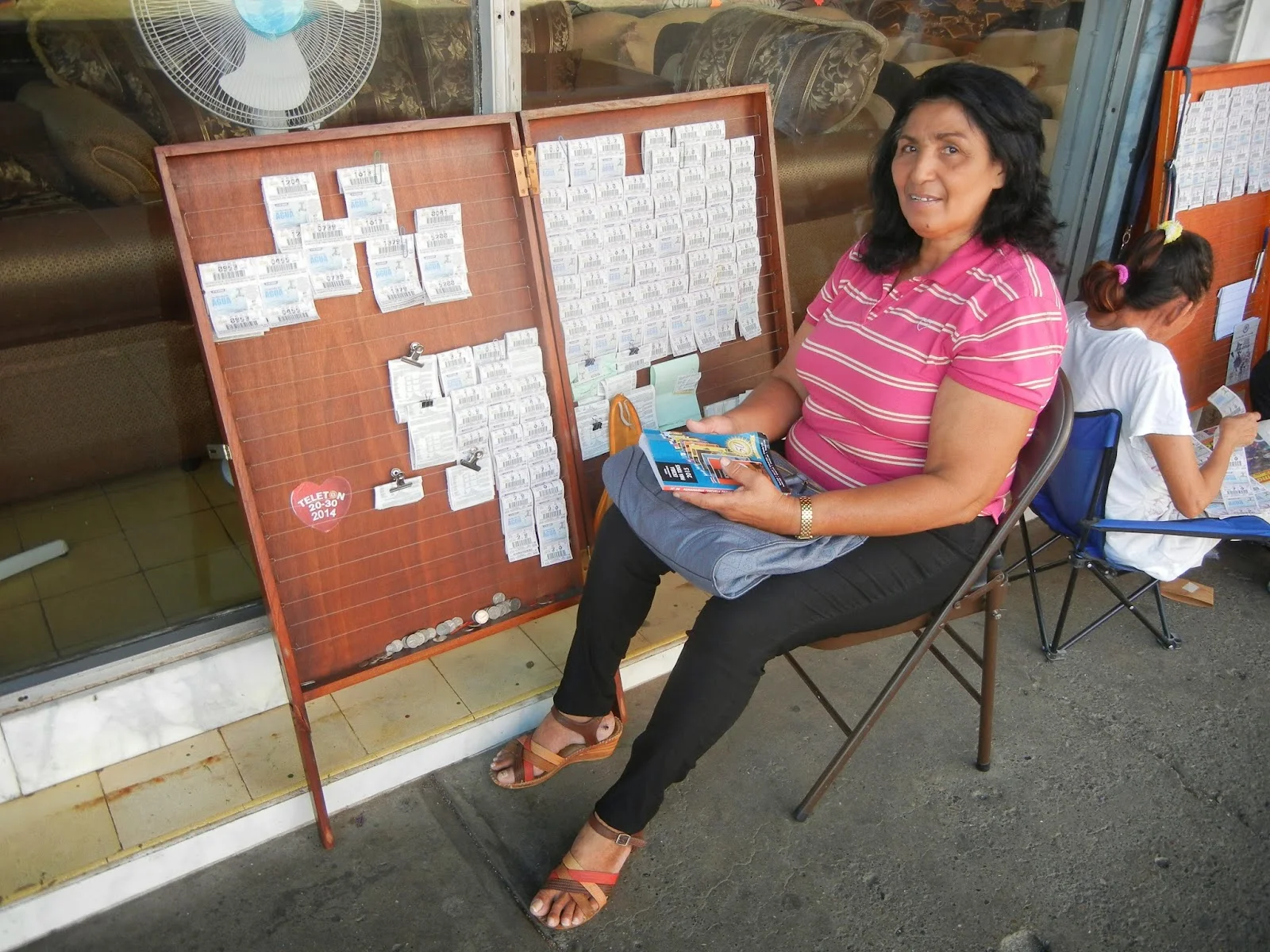 A woman selling tickets in Chitré, a provincial capital.