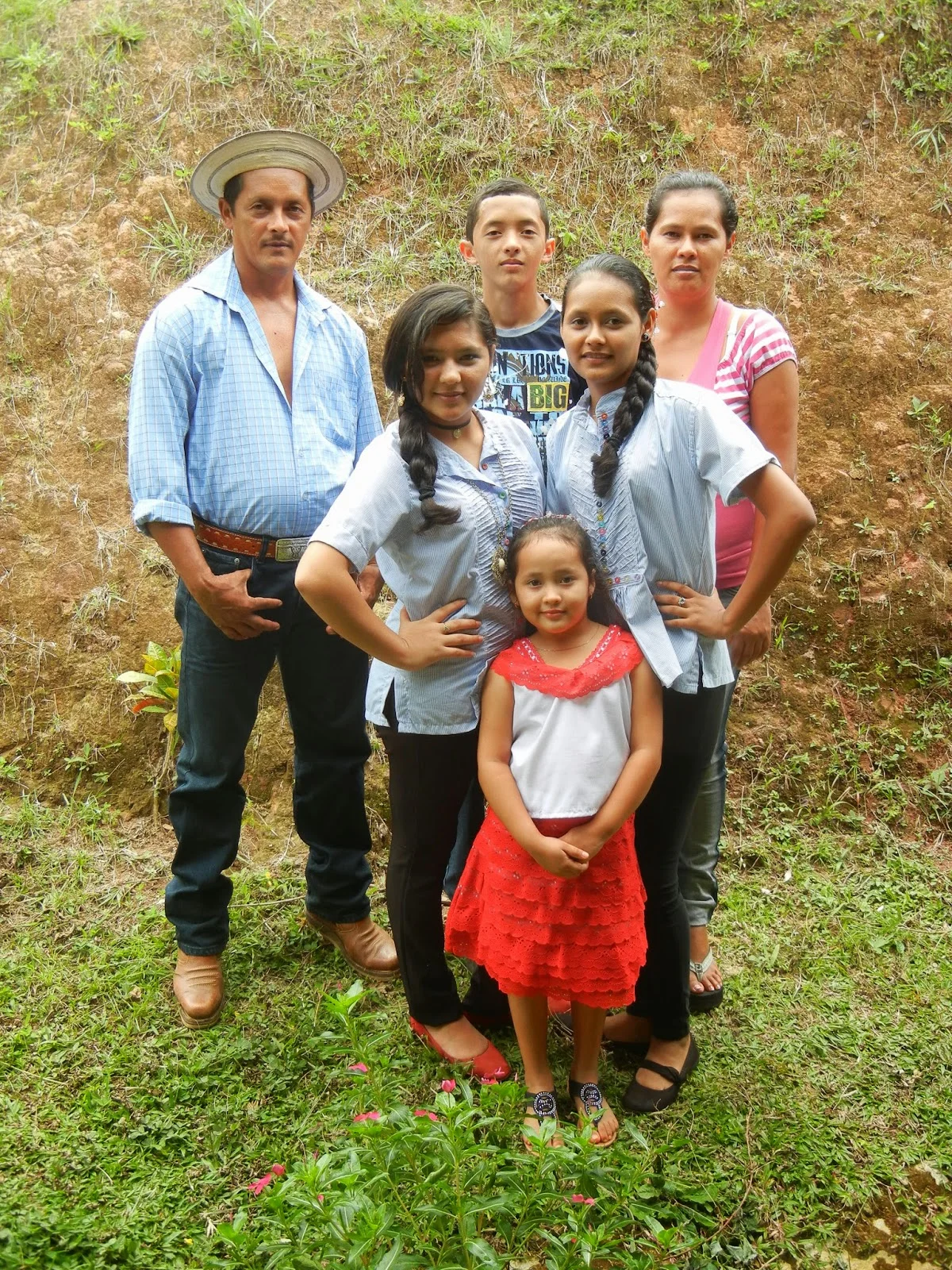 Zulai and family, dressed in their best for a school event.