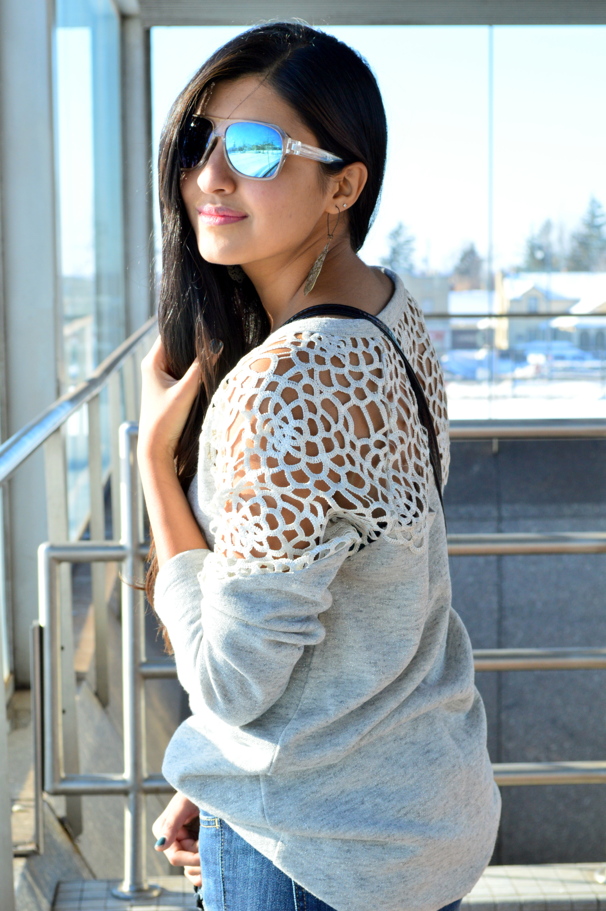 Relaxed Vibes: Laser Cut Sweatshirt + Ripped Jeans