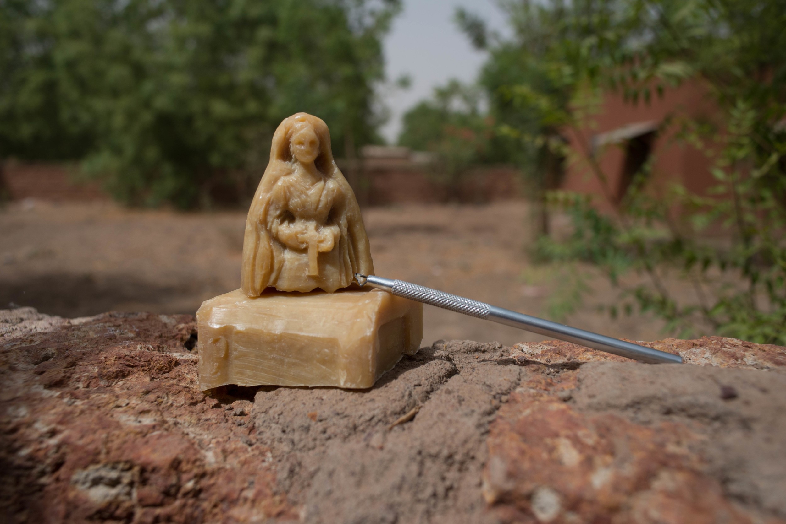  A soap figurine with Mary holding a cross.&nbsp; 