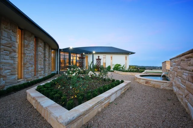 Medium Brown random rockfaced cladding capping crazy paving.jpg