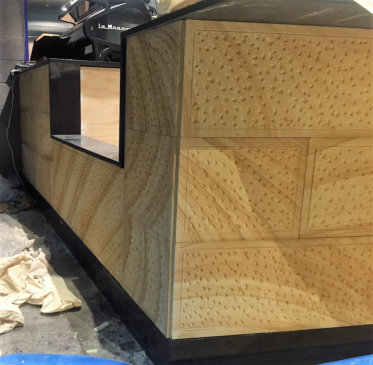 Medium brown sparrow pecked cladding with sawn margin and birdsouth joint- elite stonemasons.jpg