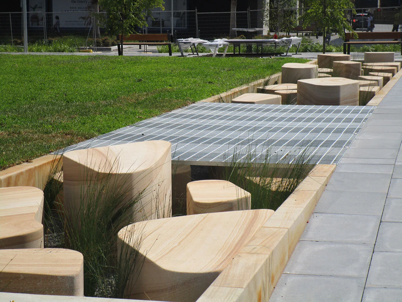 Dyuralya Square Waterloo, Gosford Quarries brown sandstone blocks