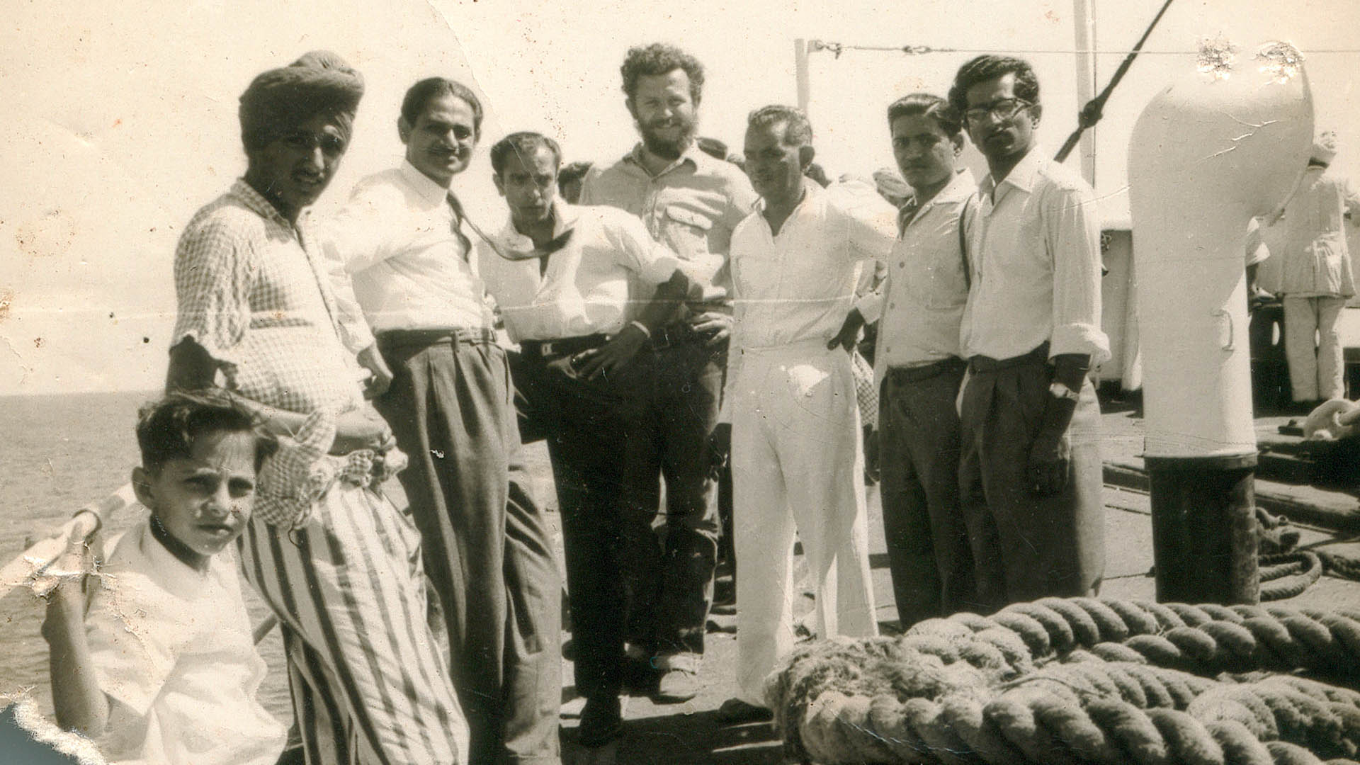 Alfred on ship with Indian men copy.jpg